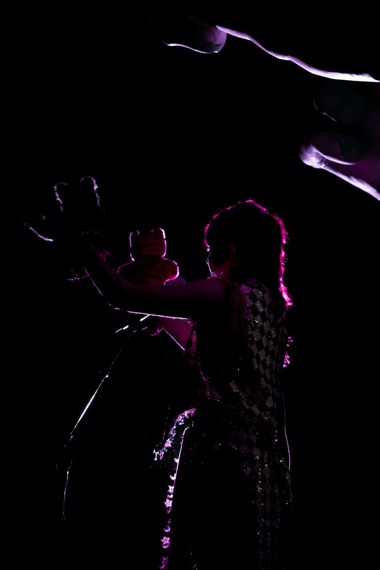  Mei nears the end of their performance with a hand puppet show during “One Man Circus.” 