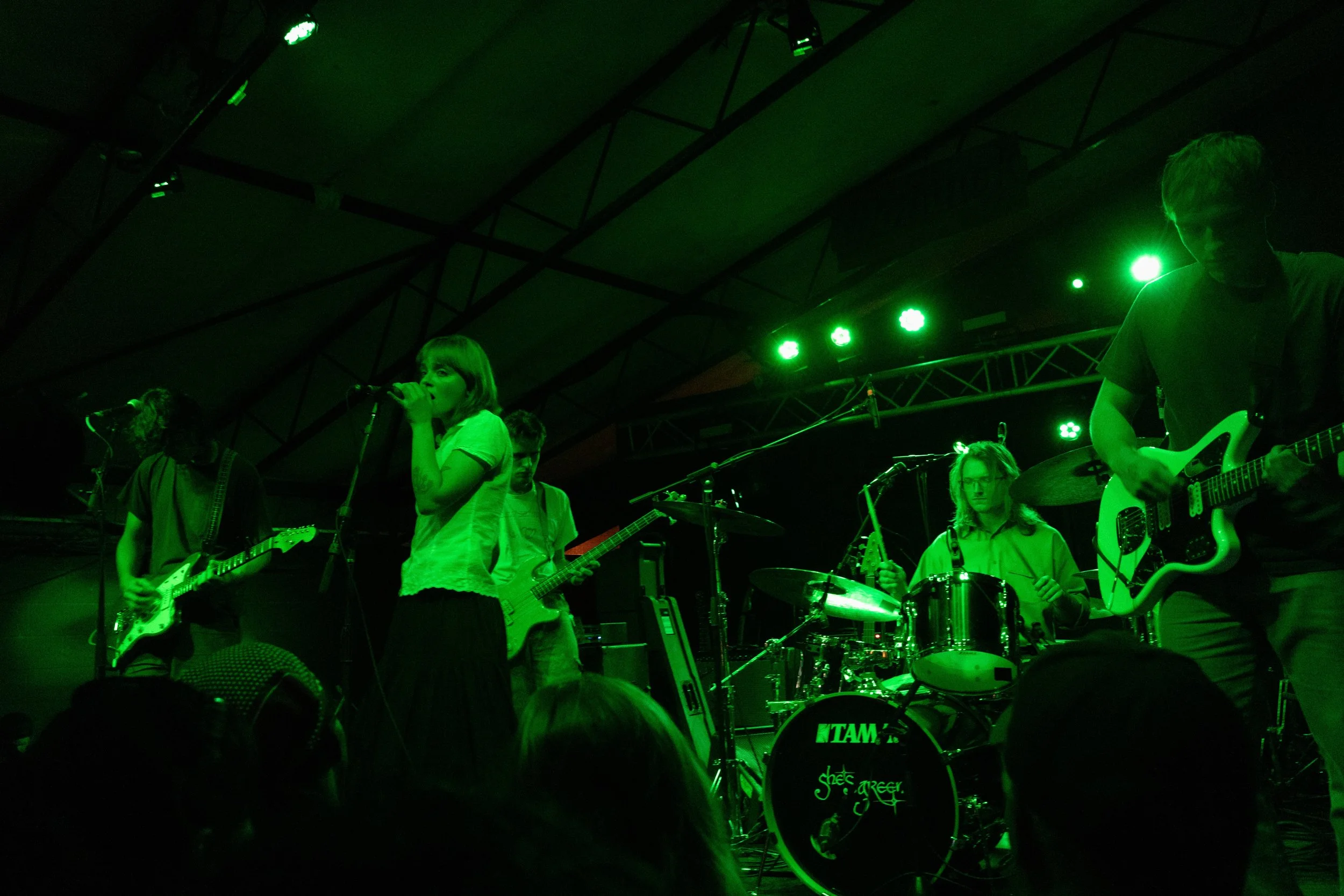  Lead singer Zofia Smith sings the ending vocals to “Graze” during she’s green’s opening set. 