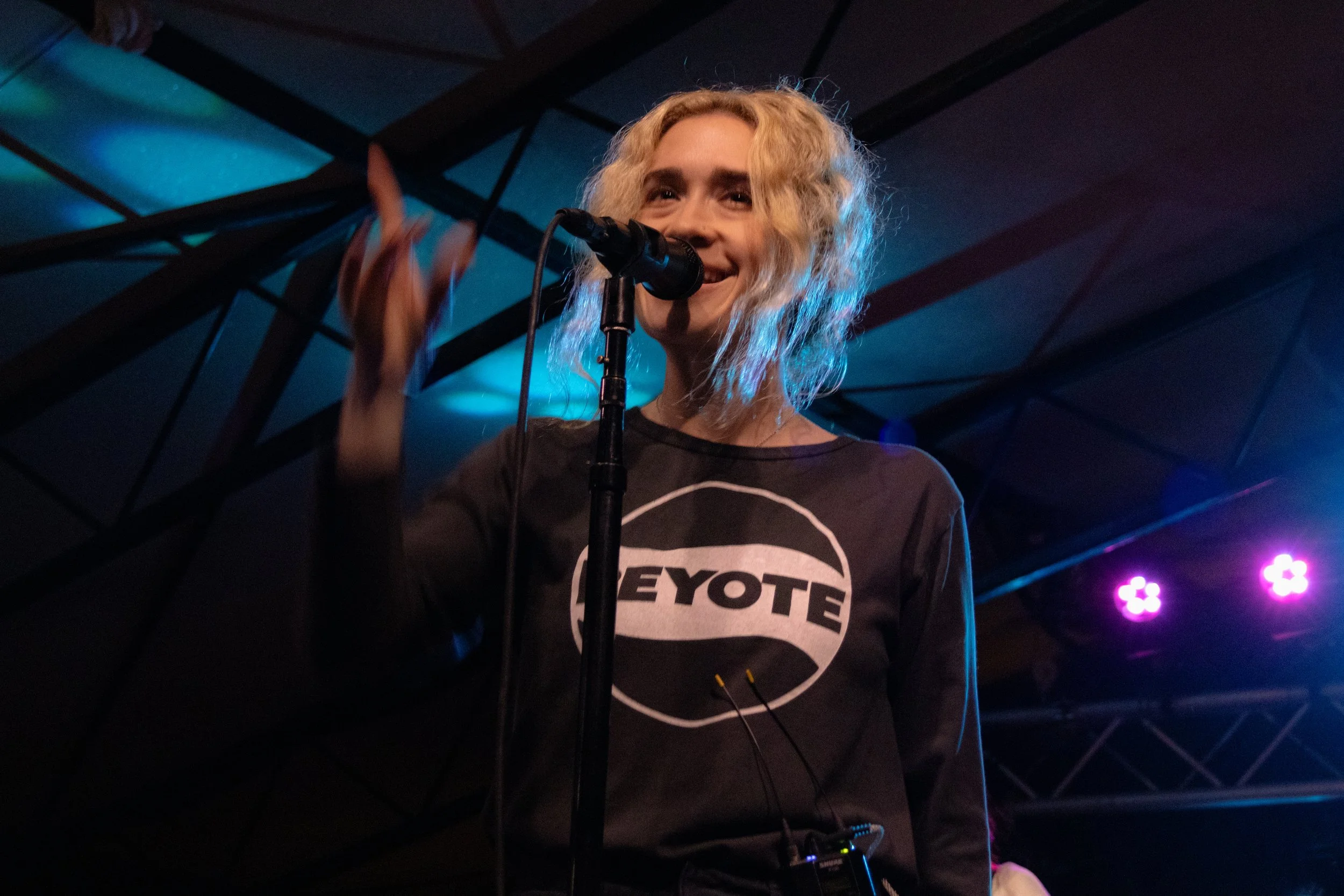  Blondshell laughs and points at audience members while singing the chorus of “23’s a Baby.” 