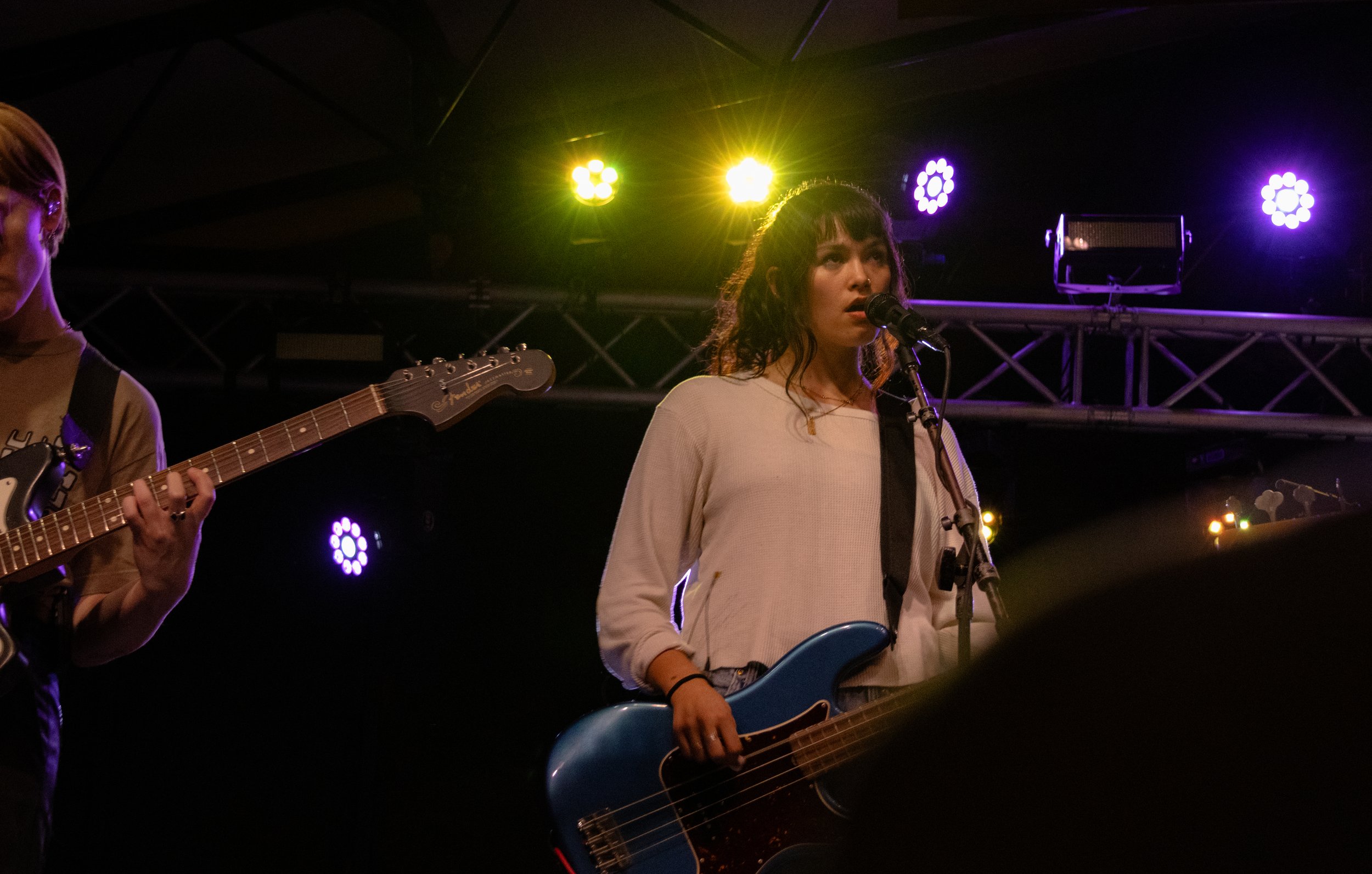  Nelson sings backup vocals for “Toy” while playing guitar. 