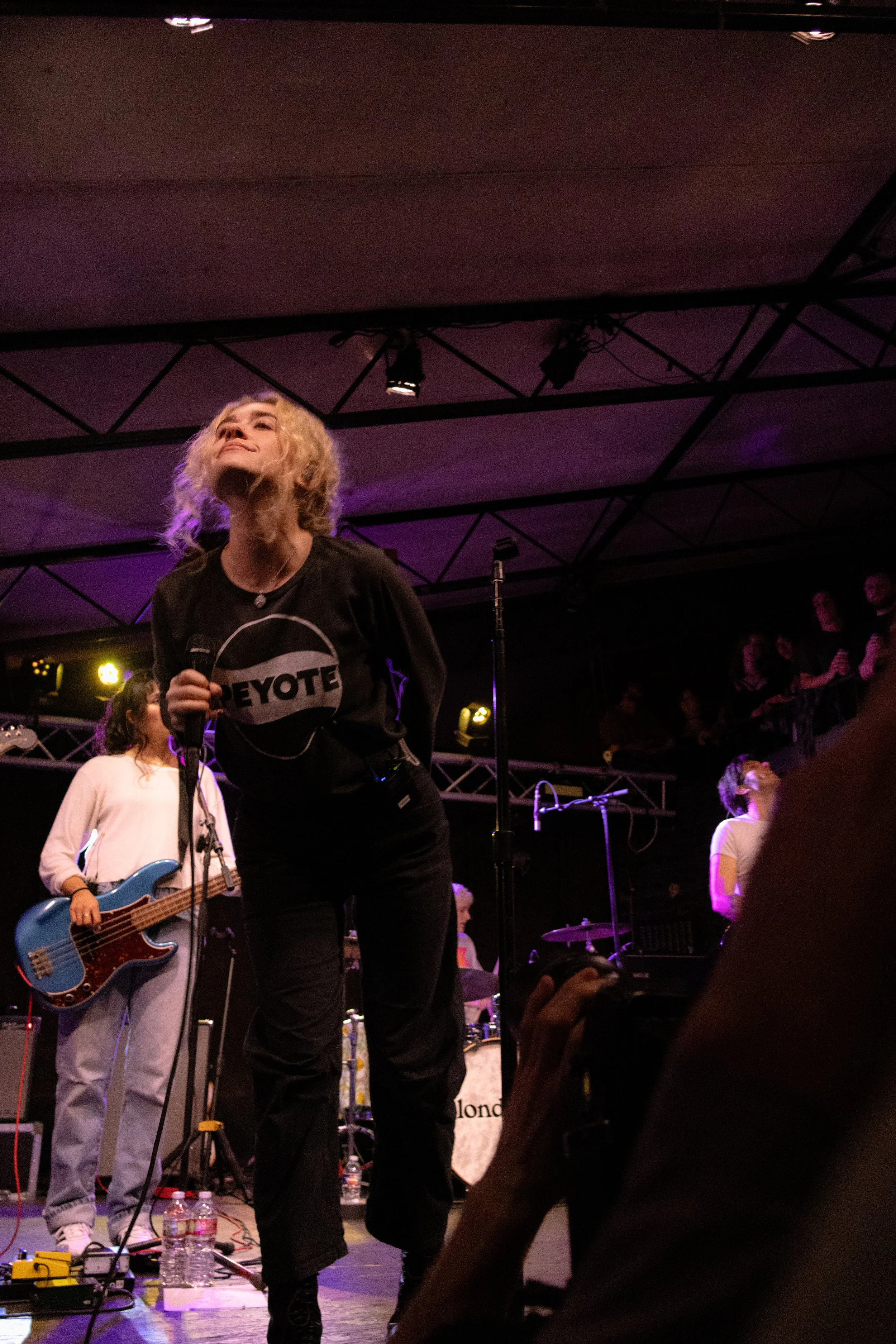  Blondshell sticks her head out to the crowd in amusement while singing the chorus for “Toy.” 