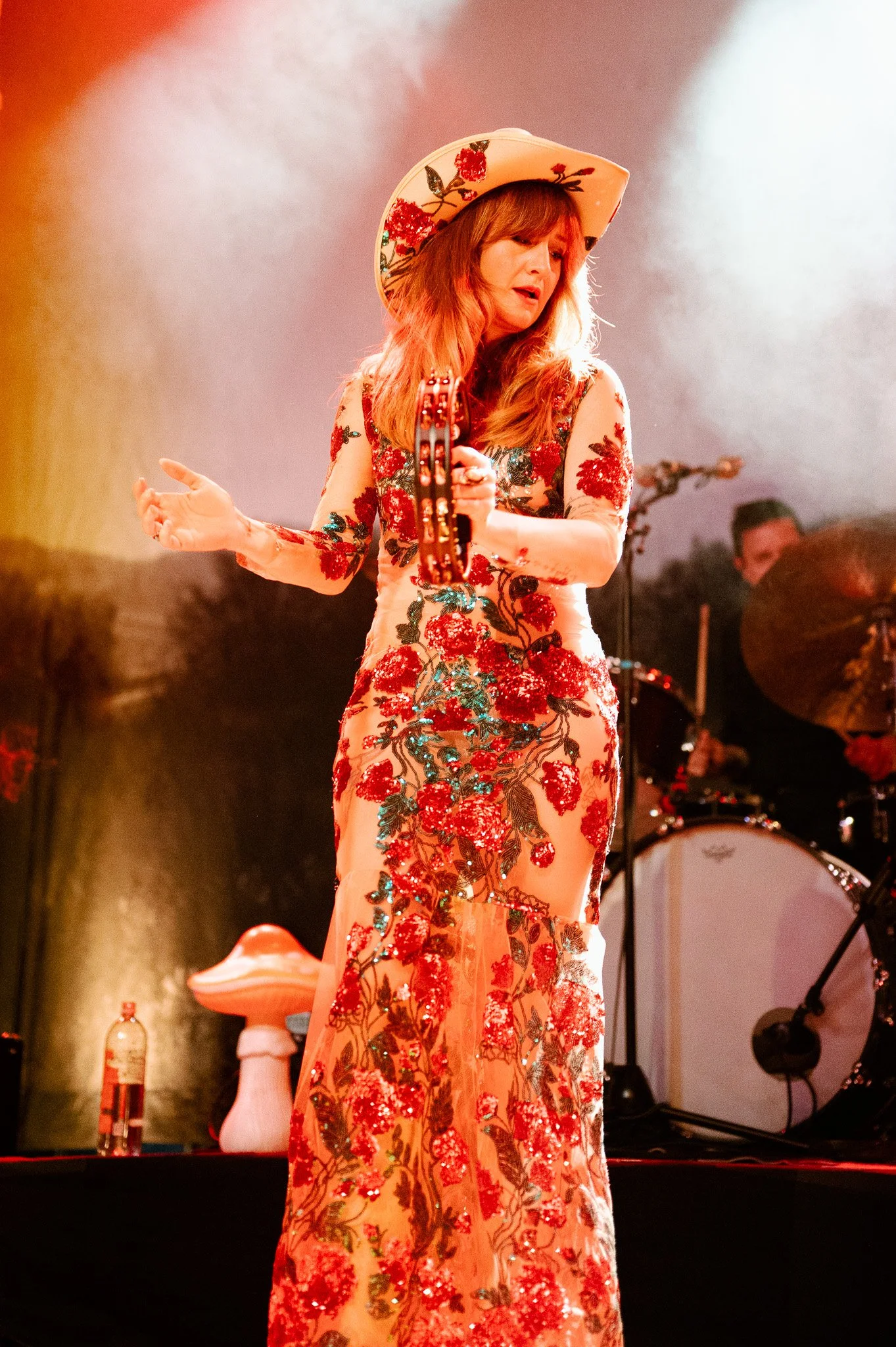  Tambourine in hand Price brings vibrant energy to her song “Red Eye Flight.” 