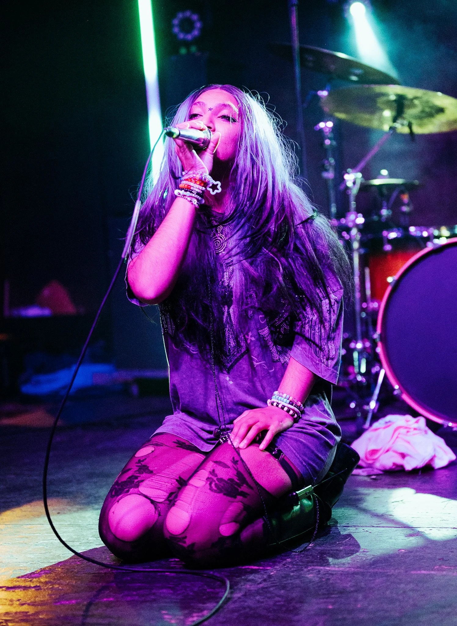  Singing a psychedelic unreleased song, ivri sinks to the floor. 