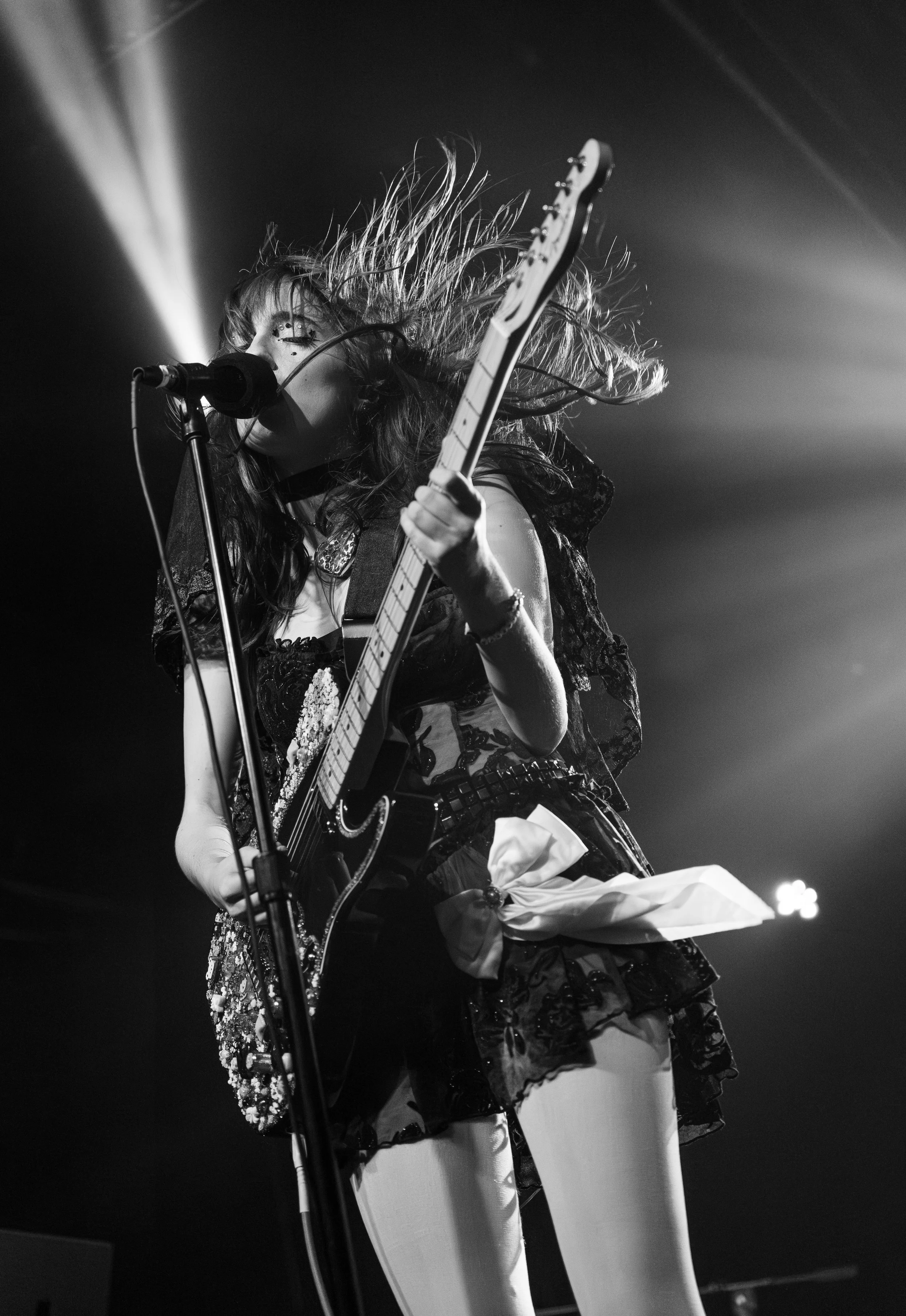  Valentine picks up her guitar to strum the haunting and sensual chords of “into me.” 