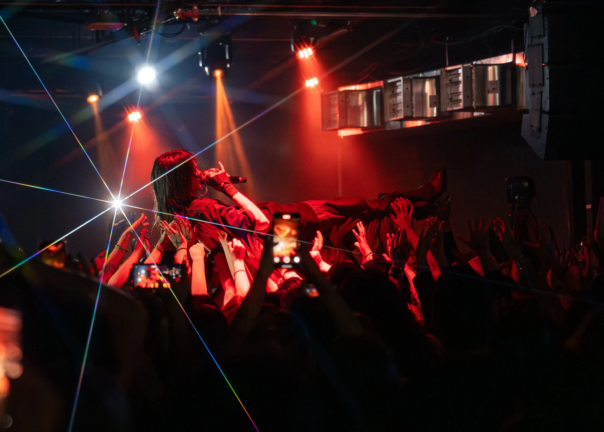  Isella crowd surfs during “Orchestrated, Wet, Verboten.” 