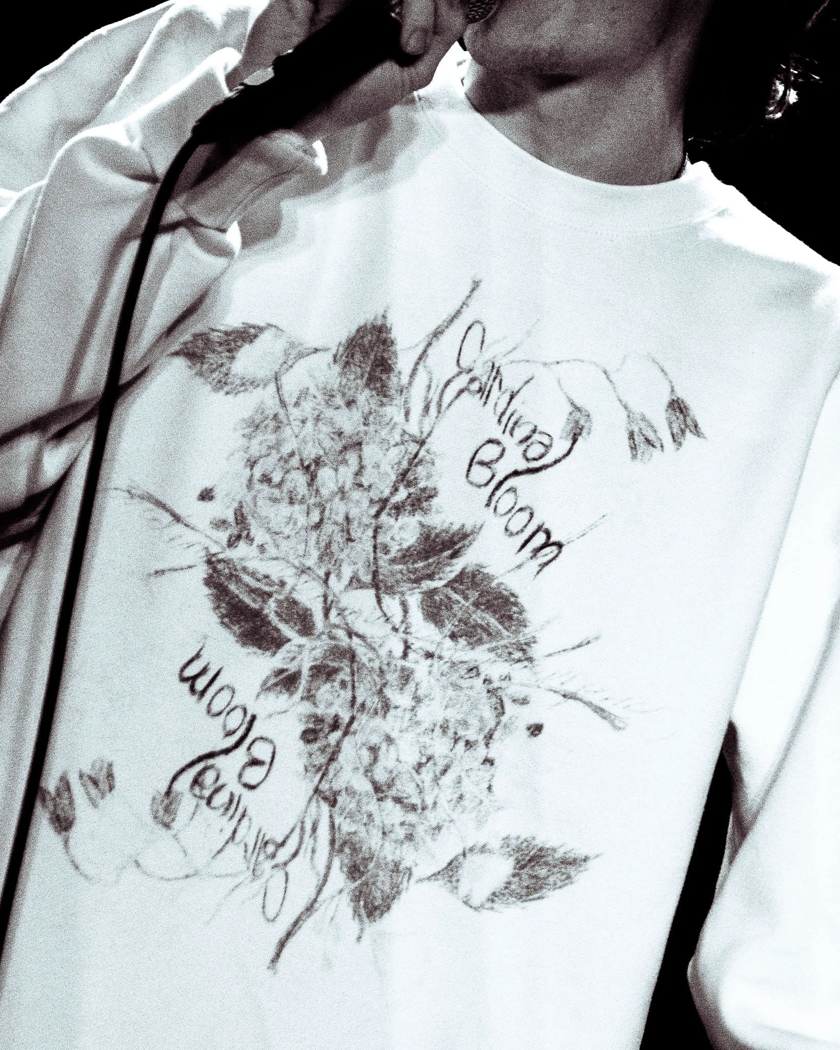  Moore wears Cardinal Bloom’s crewneck on the final night that Cardinal Bloom opened for Dogpark. 