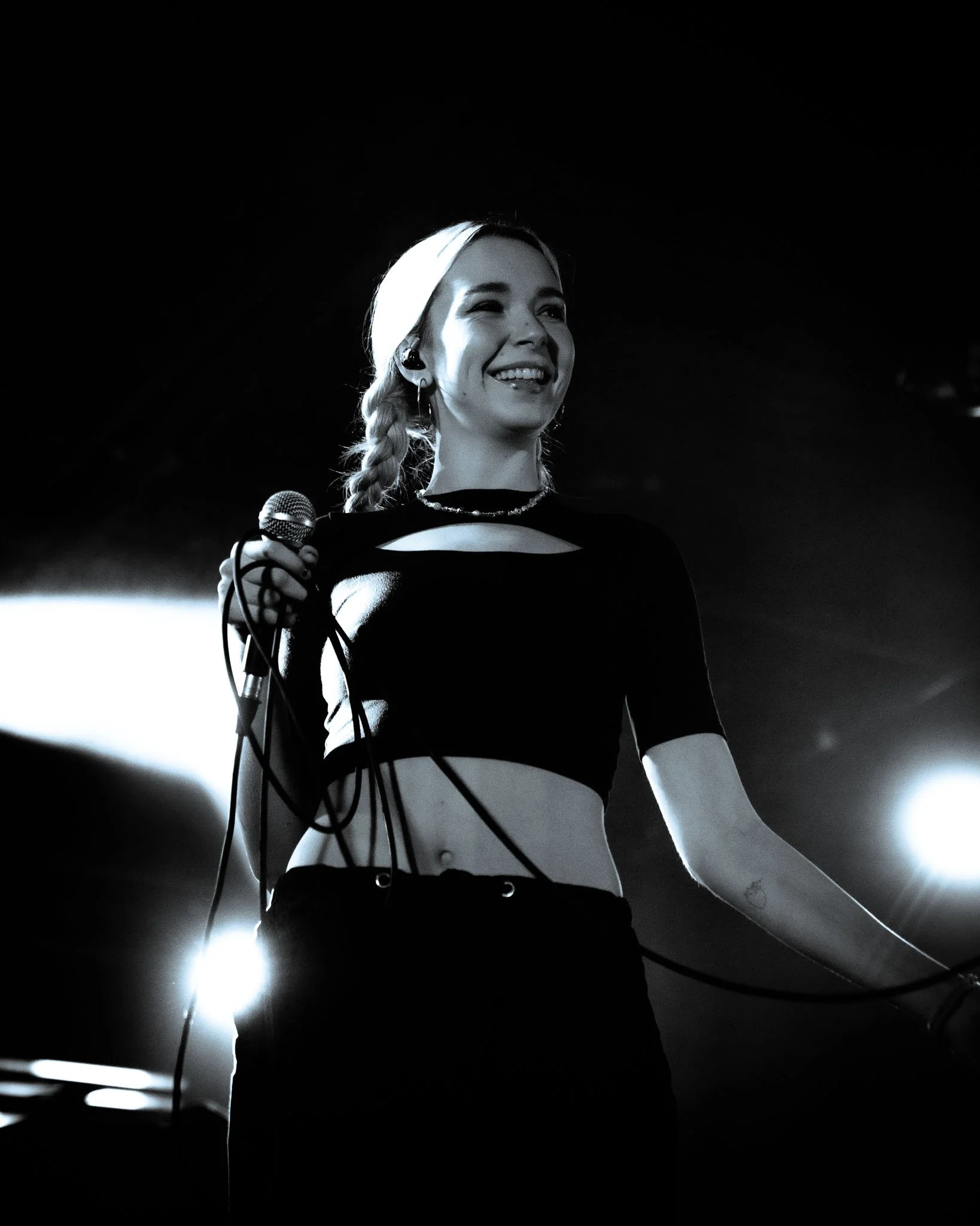  Lydia Night smiles as she looks into the crowd while performing songs from her debut album  Parody of Pleasure . 