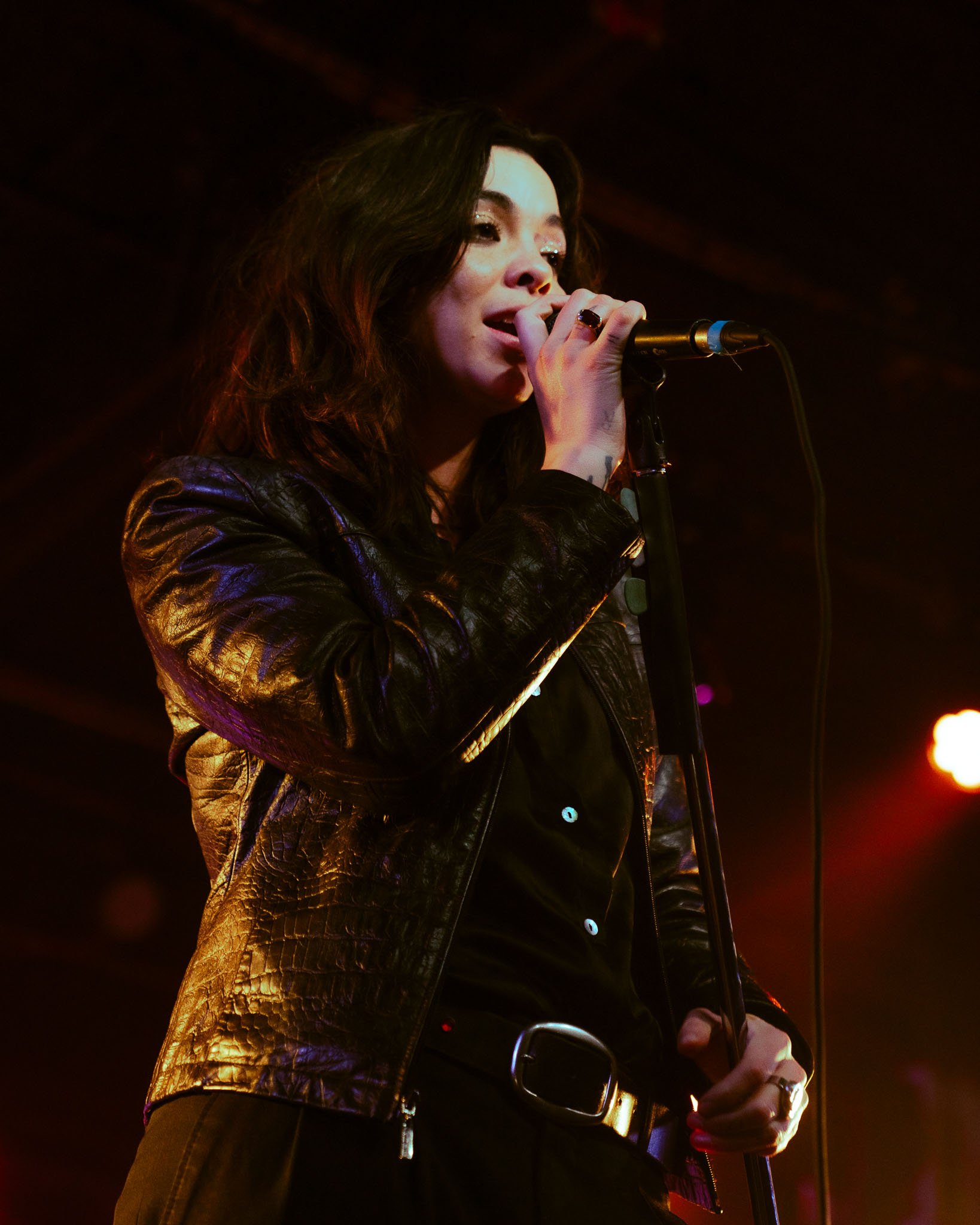  Lead vocalist Cristal Ramirez’s rich vocals complement the bassline as she sings the lyrics to “Jealous”: “How do you walk, do you talk so cool? / Where’d you get your hair cut? / Where’d you get those tattoos?” 