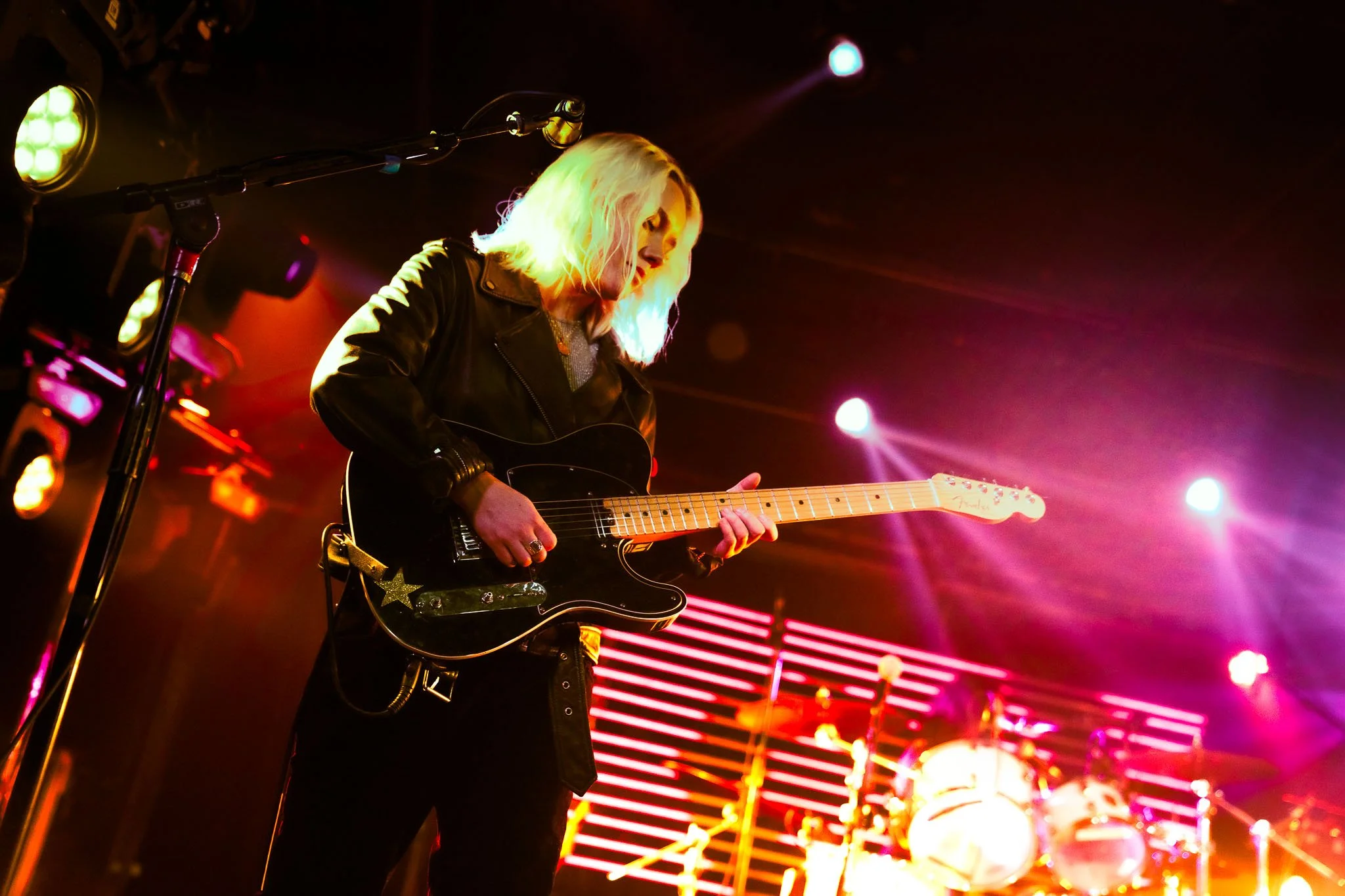  Guitarist Katie Henderson keeps the beat during “New Emotion,” a track from The Aces’ 2020 album  Under My Influence . 