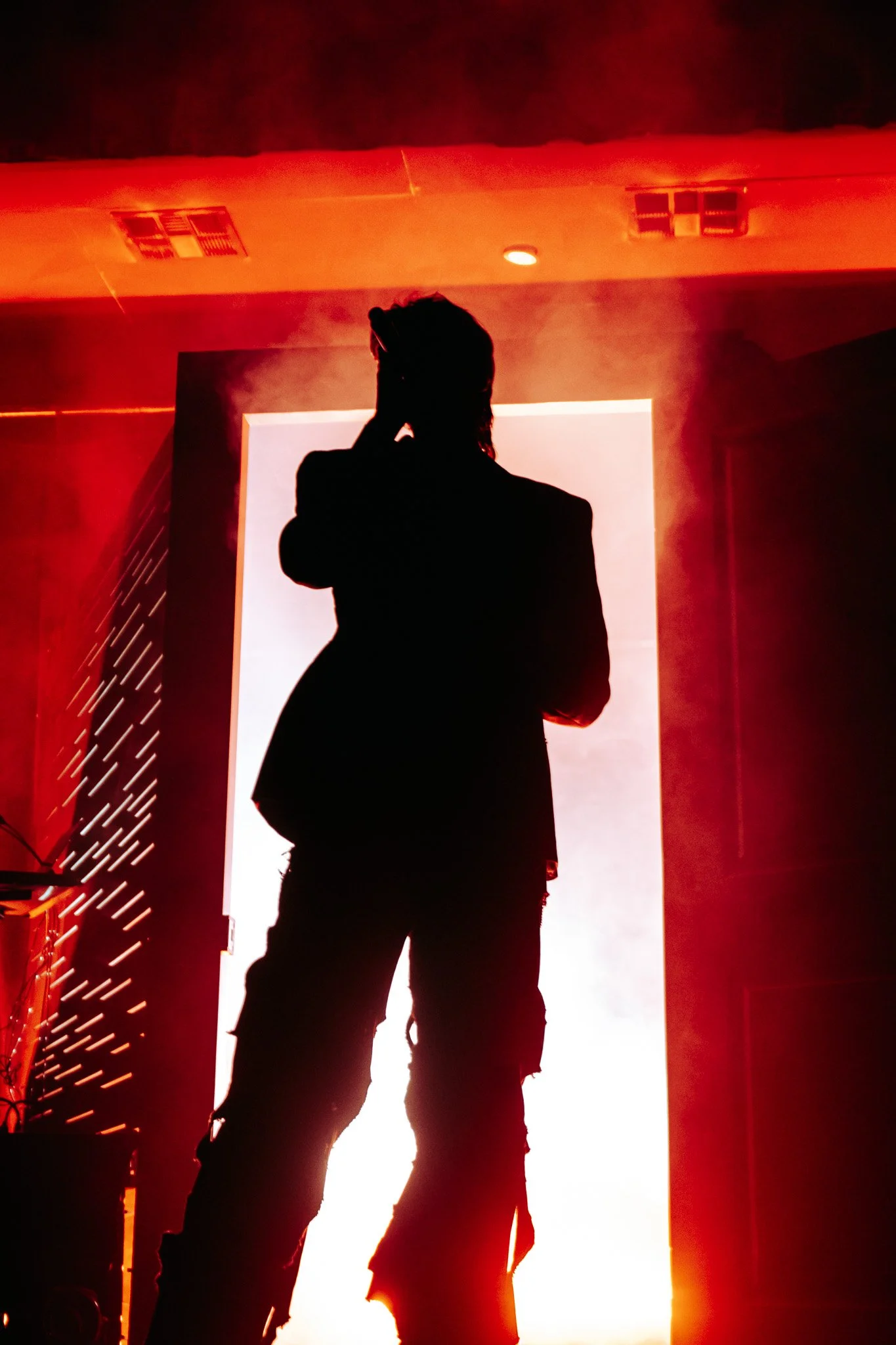  Ruel steps through a door during an ambient introduction to the ‘Kicking My Feet’ tour. 