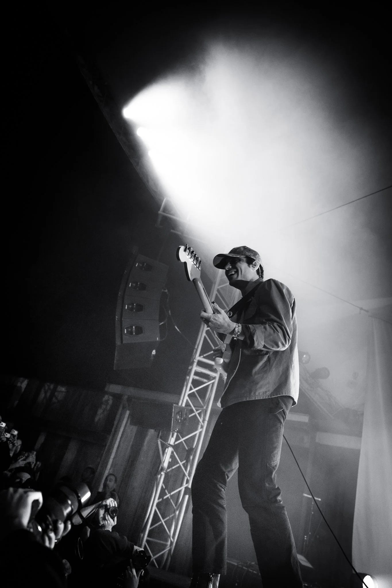  During “Better Than I Know Myself,” Jaffe stands on a speaker and smiles at the crowd. 