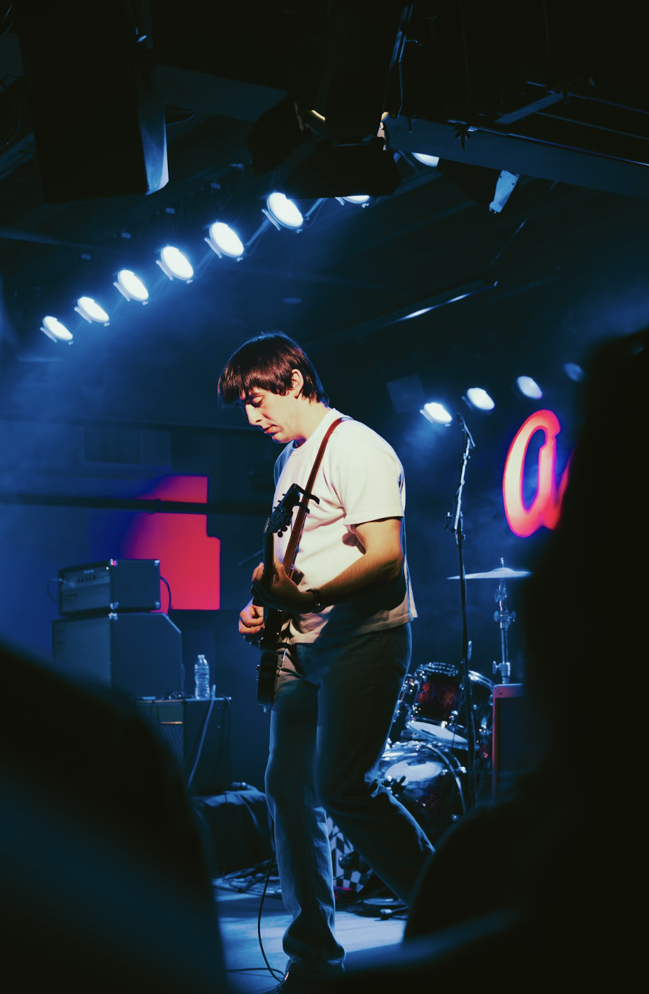  Lead guitarist Ian Marmande strums his guitar during a performance of their recent release “Lips.” 