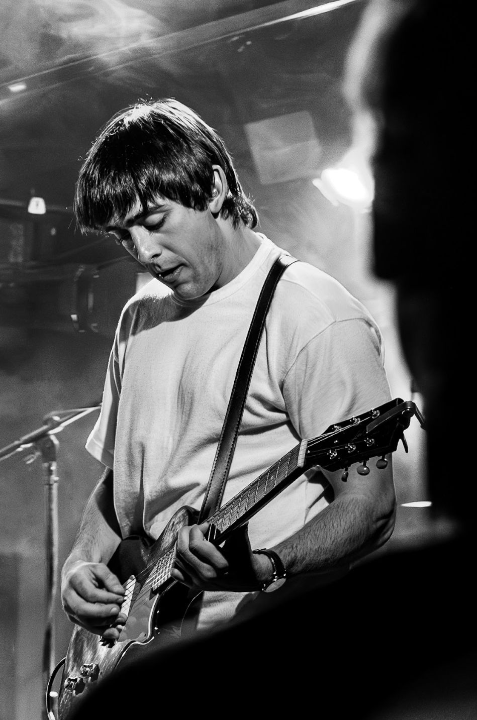  Lead guitarist Ian Marmande strums his guitar during a performance of their recent release “Lips.” 