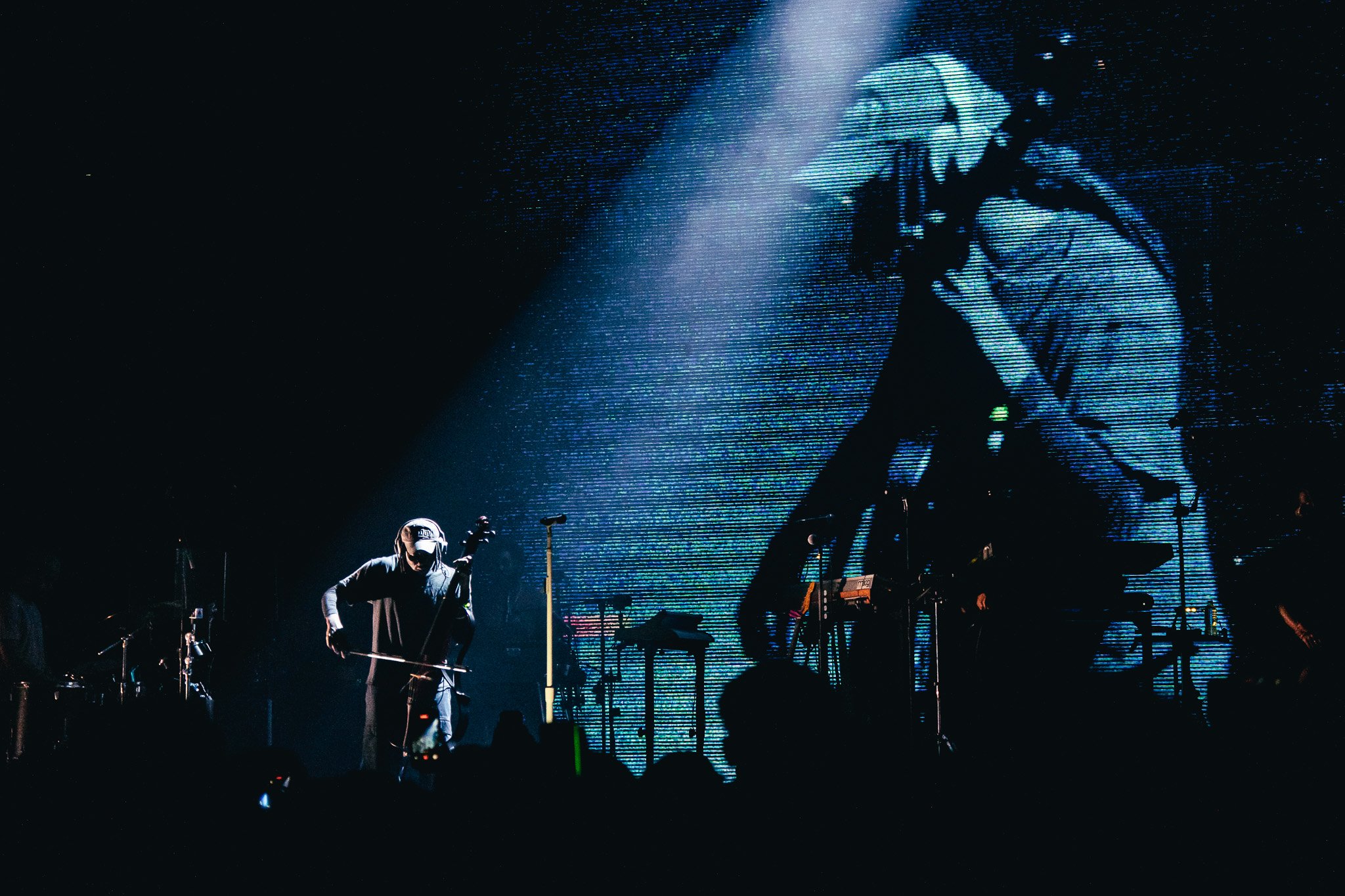  True to his multi-genre character, Hynes switches from the mixing board to a stand-up bass to cover The Smiths’ “How Soon Is Now?” 