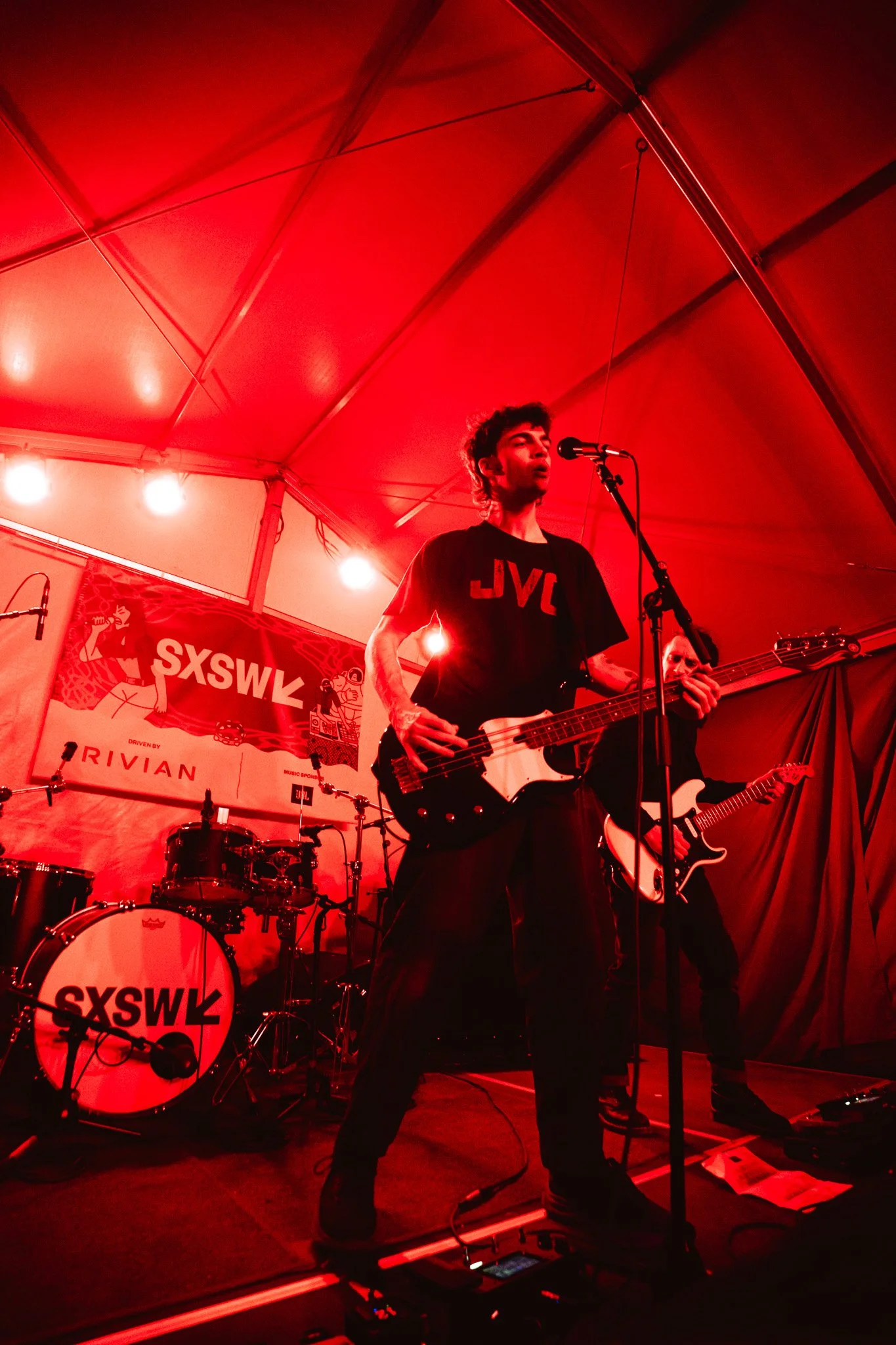  Stare Away rocks out under red lights at Seven Spirits’ official SXSW Showcase. 
