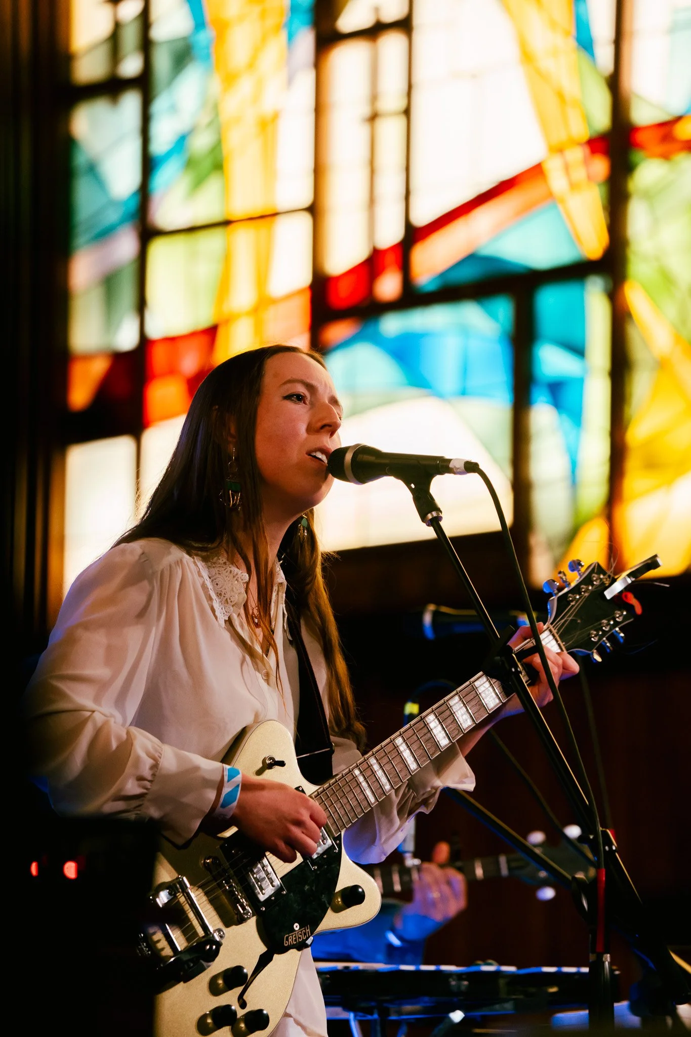  England-based folk-rock artist Lila Tristram kicked off the final showcase at Central Presbyterian Church, her rich vocals and instrumentals filling the colorful space. 