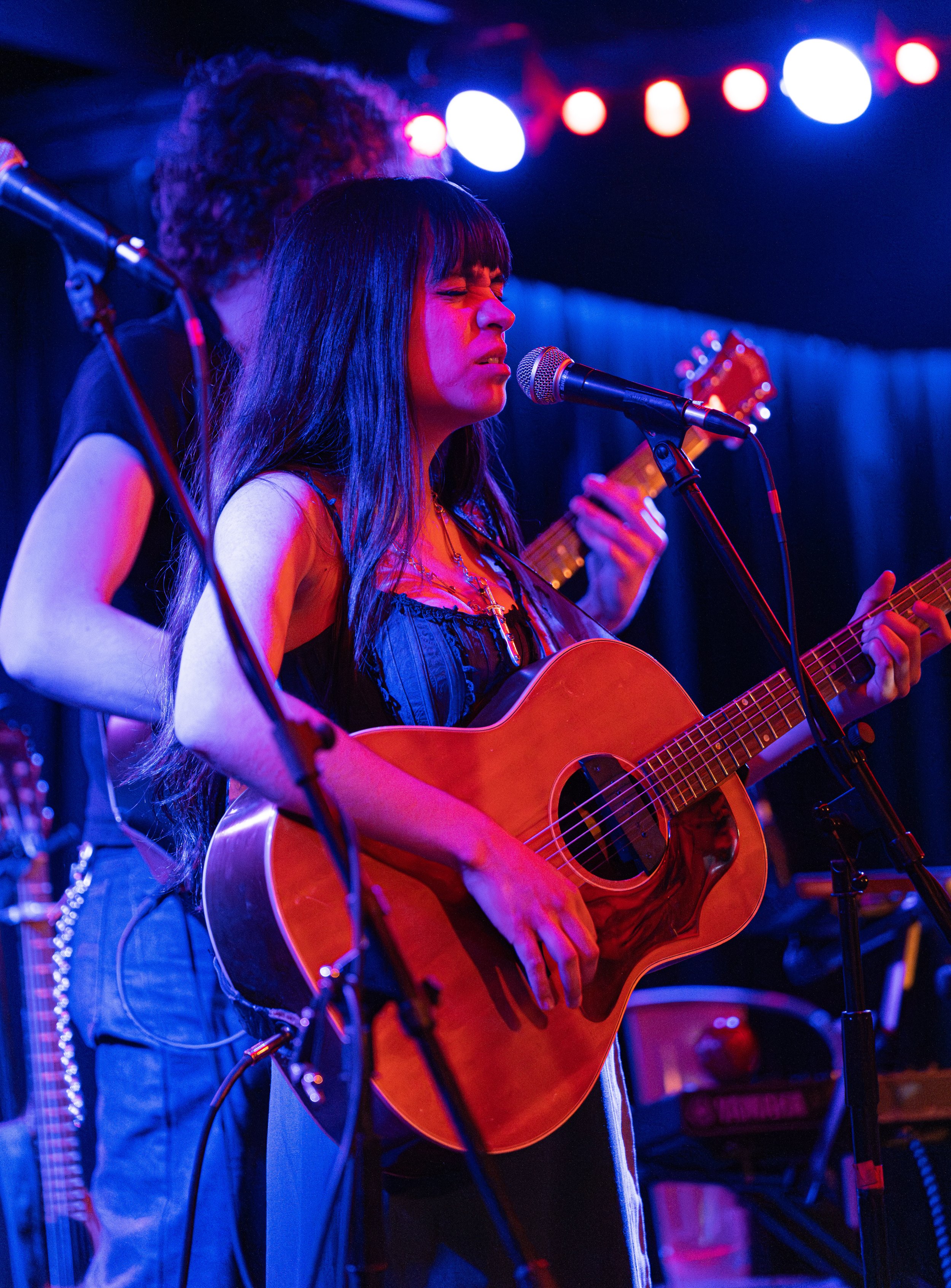  Singer-songwriter Storey Littleton opens the night with “Quit It” off her debut album  At a Diner.  