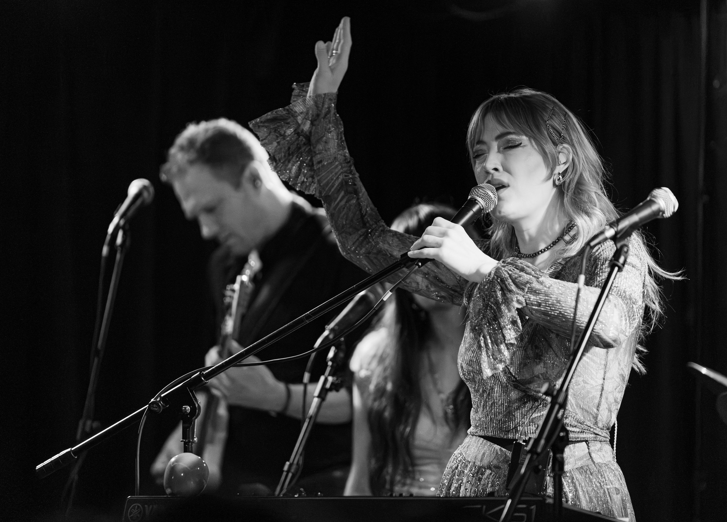  Murr lifts up her hands as she sings the mellow lyrics of “In the Wings”: “I spend a lot of time in / The gallery of memory / The walls are thin / Somehow I thought you’d be waiting.” 