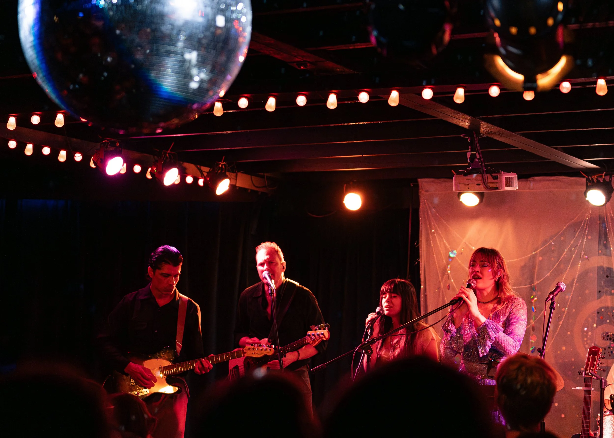  From left to right, Baron, Preston, Littleton, and Murr perform “How Do You Get By” from Murr’s newest album  Run To The Center  to   a crowd of adoring fans. 