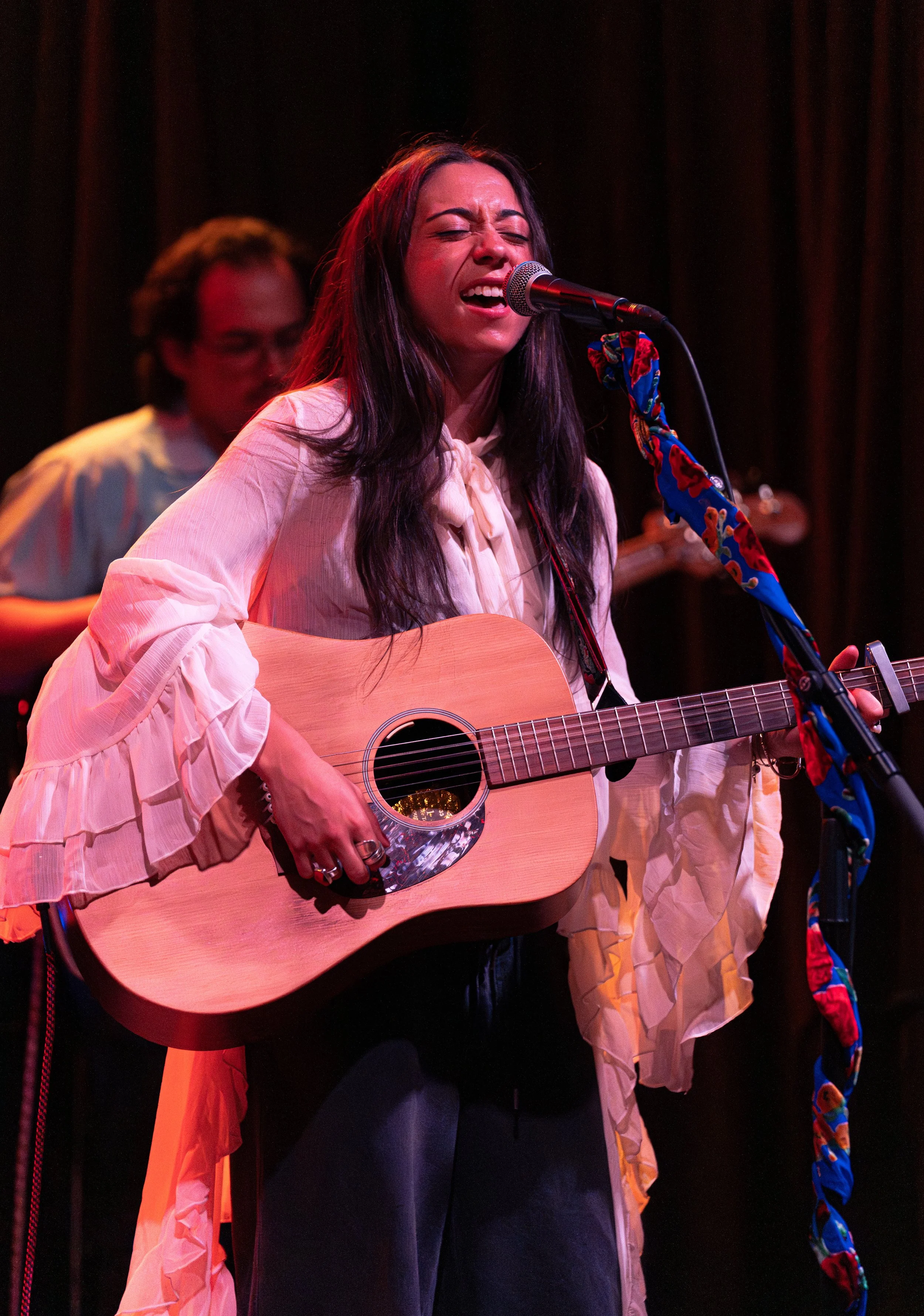  Singer-songwriter Kohanna opens the night singing the colorful lyrics of “The Waltzer”: “Drive until you run out of gas / So won’t you drive, real fast / Italian cowboy, don’t take your foot off the gas.” 