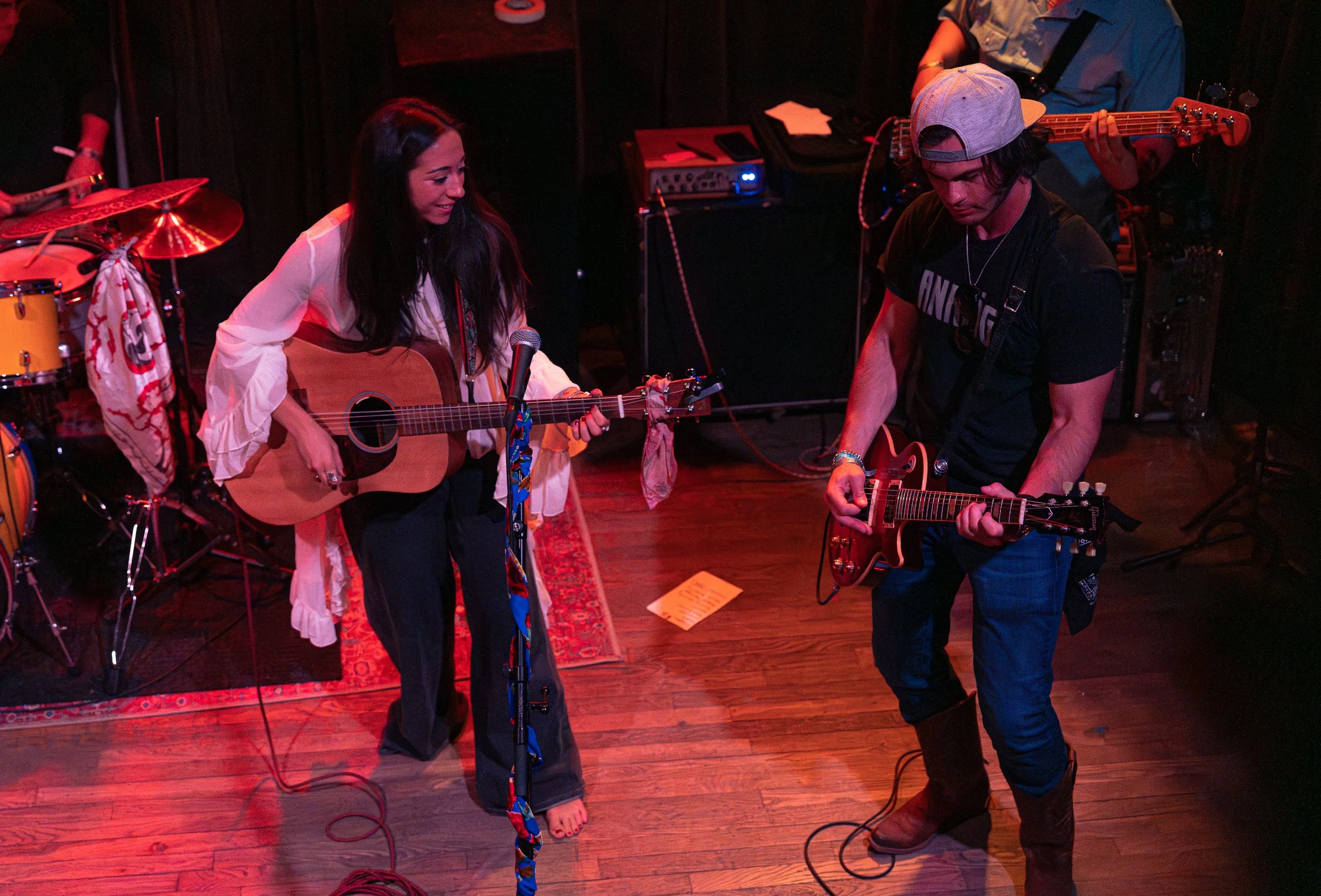  Kohanna and her band perform her last song of the night, “Colorado,” chanting the lyrics: “Pick me up / Where we going / Colorado.” 