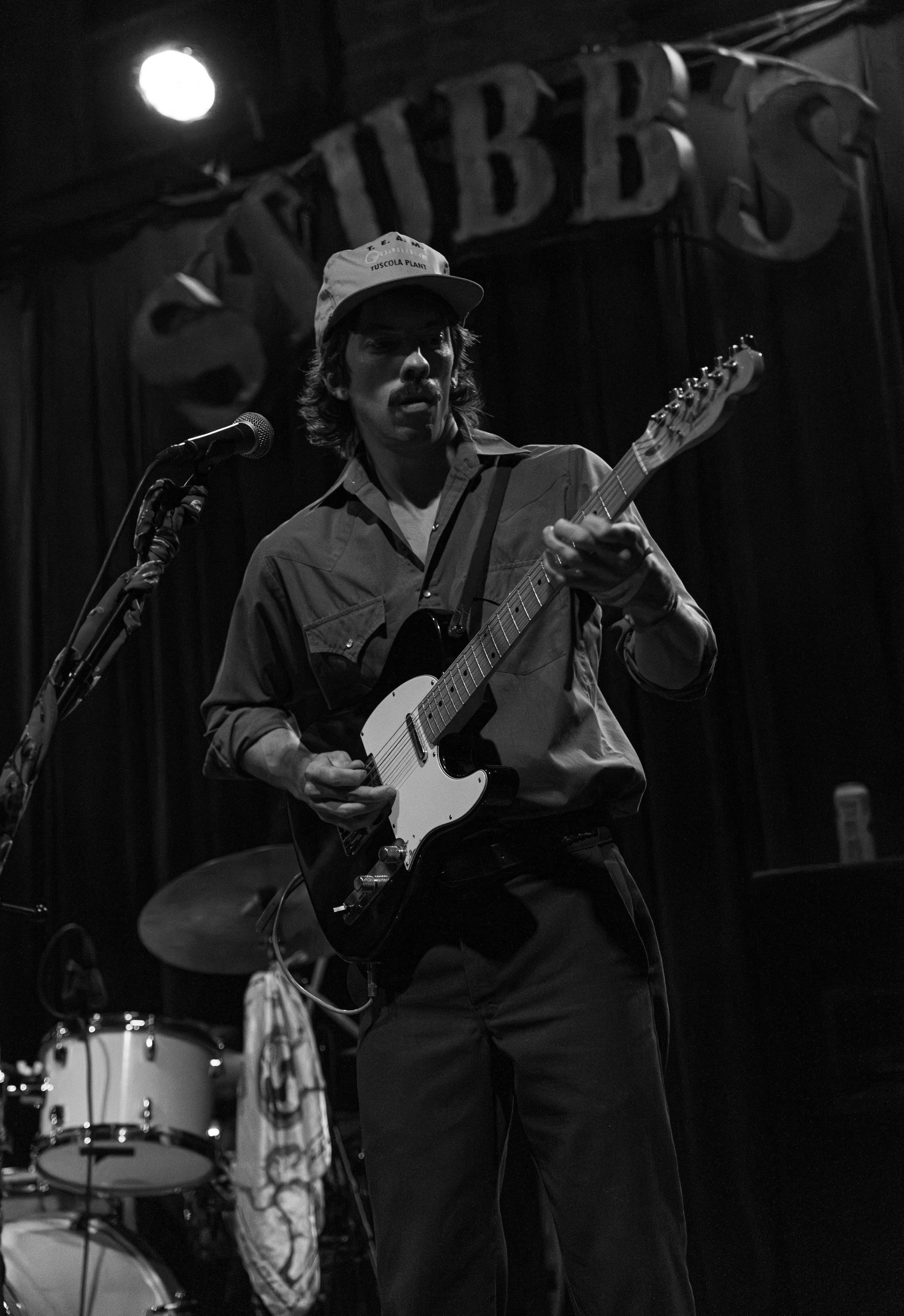  Singer-songwriter Tuskola takes the stage to sing the slow melodies and lyrics of “Yr Dog”: “I was hoping I could be your dog, got a collar I've been waiting to use / you've got a whistle only I can hear and it plays my favorite tune.” 