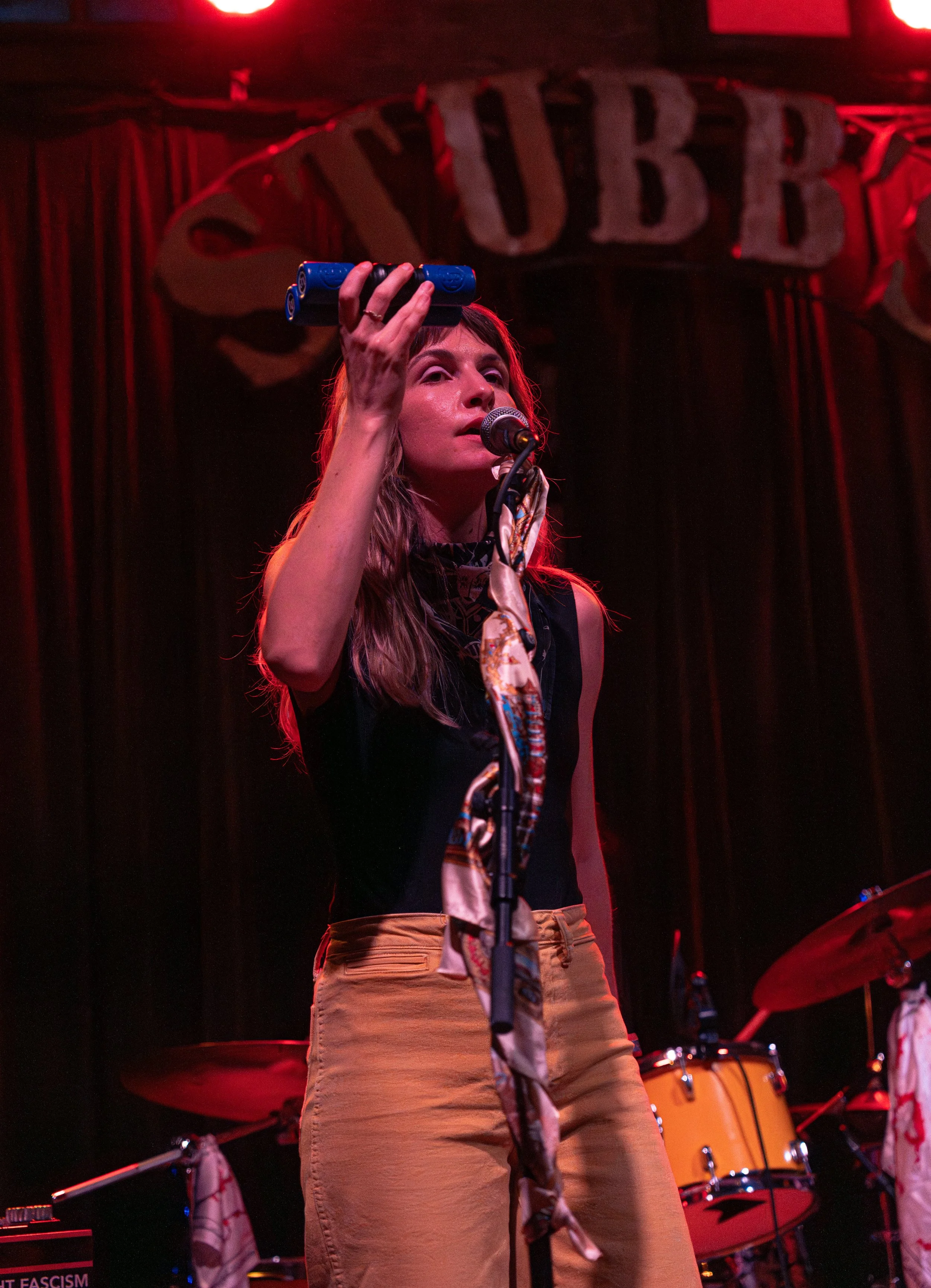  Singer-songwriter Sonia McLaughlin sings back up vocals and plays a shaker during “Thunderbolts.” 