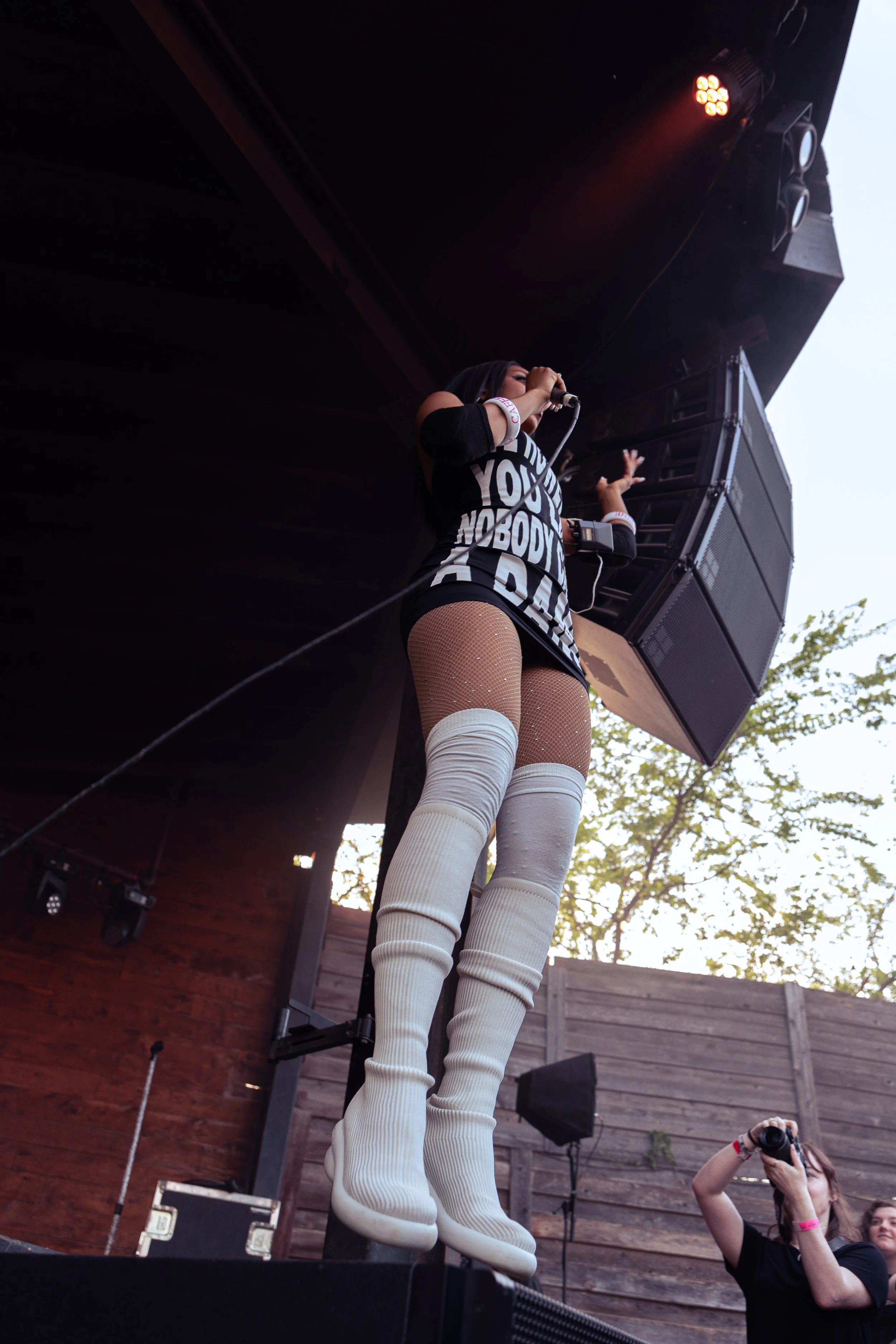  Alternative pop-rap artist BAYLI hypes up the audience during her opening set. 