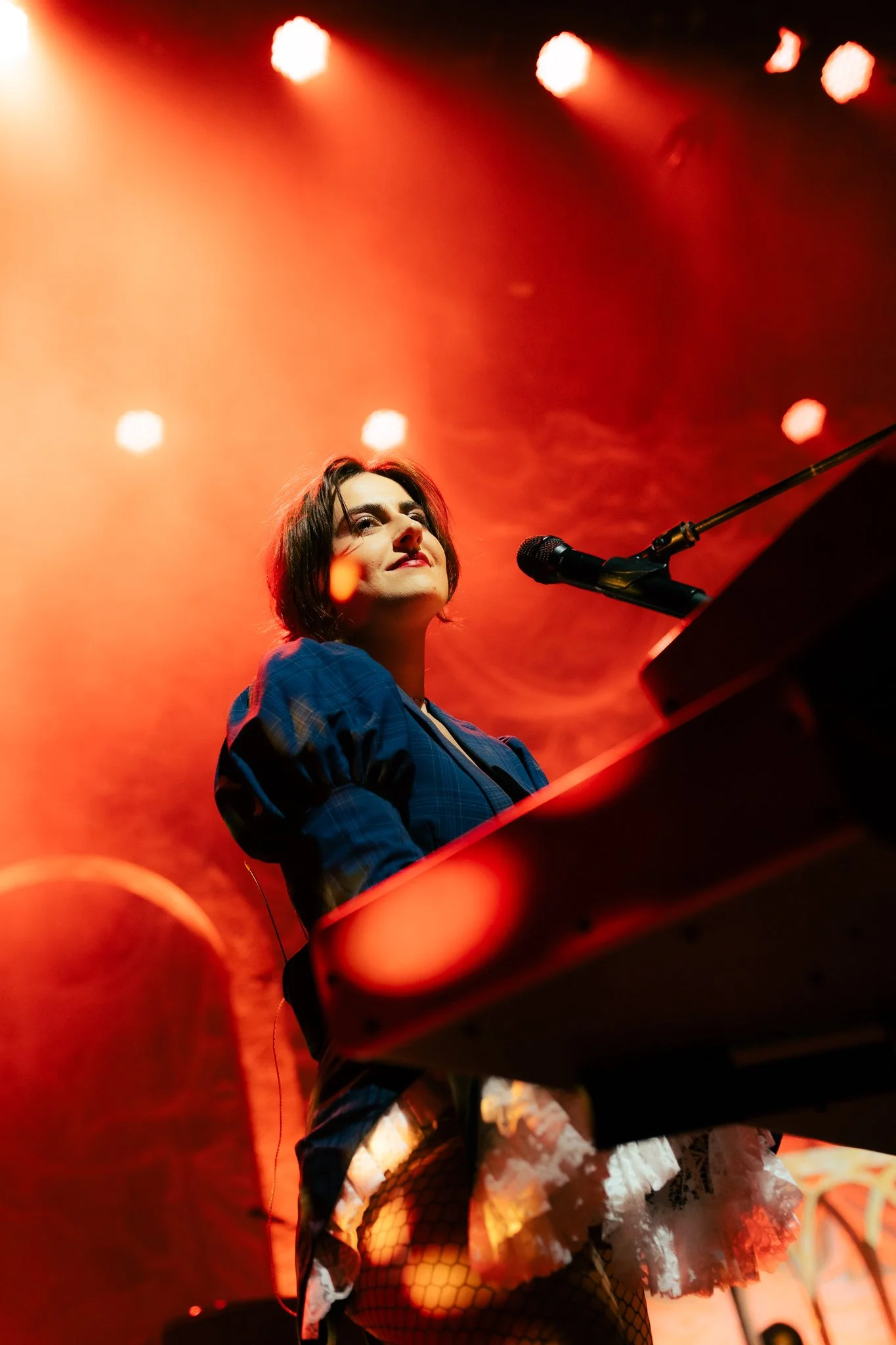  Keyboardist and vocalist Aurora Nishevci grins as she looks into the crowd during “Count The Ways.” 