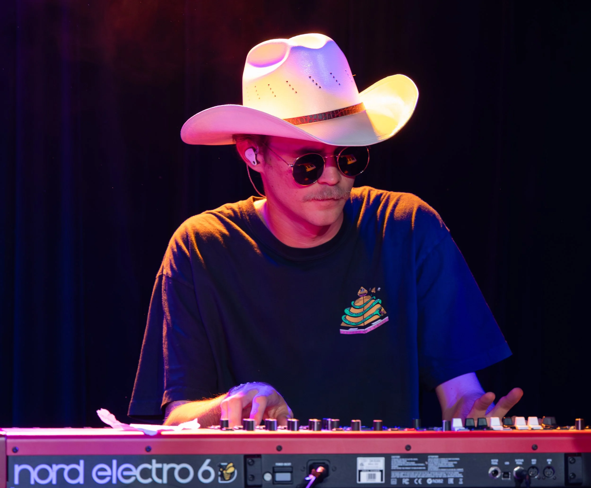  Keyboardist Robert Buffington plays to "Feel It All Again." 