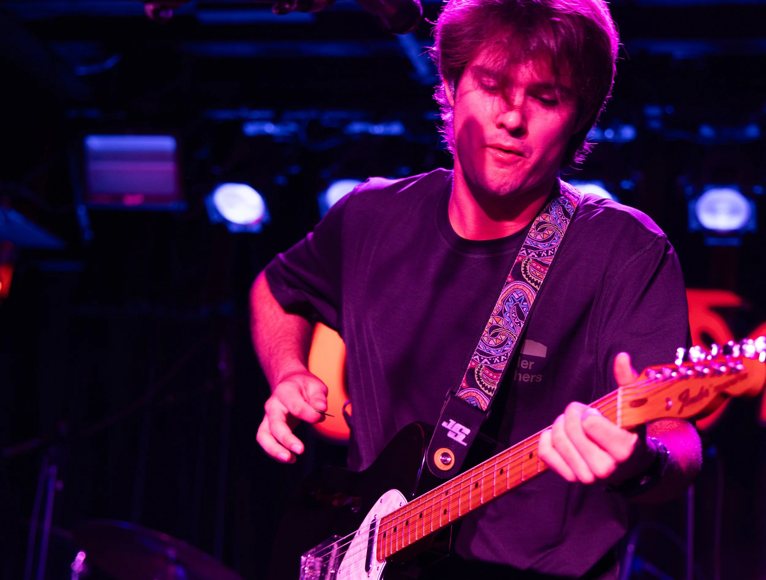  8-9. Rowland jumps around the stage as he plays the chords to "XO." 