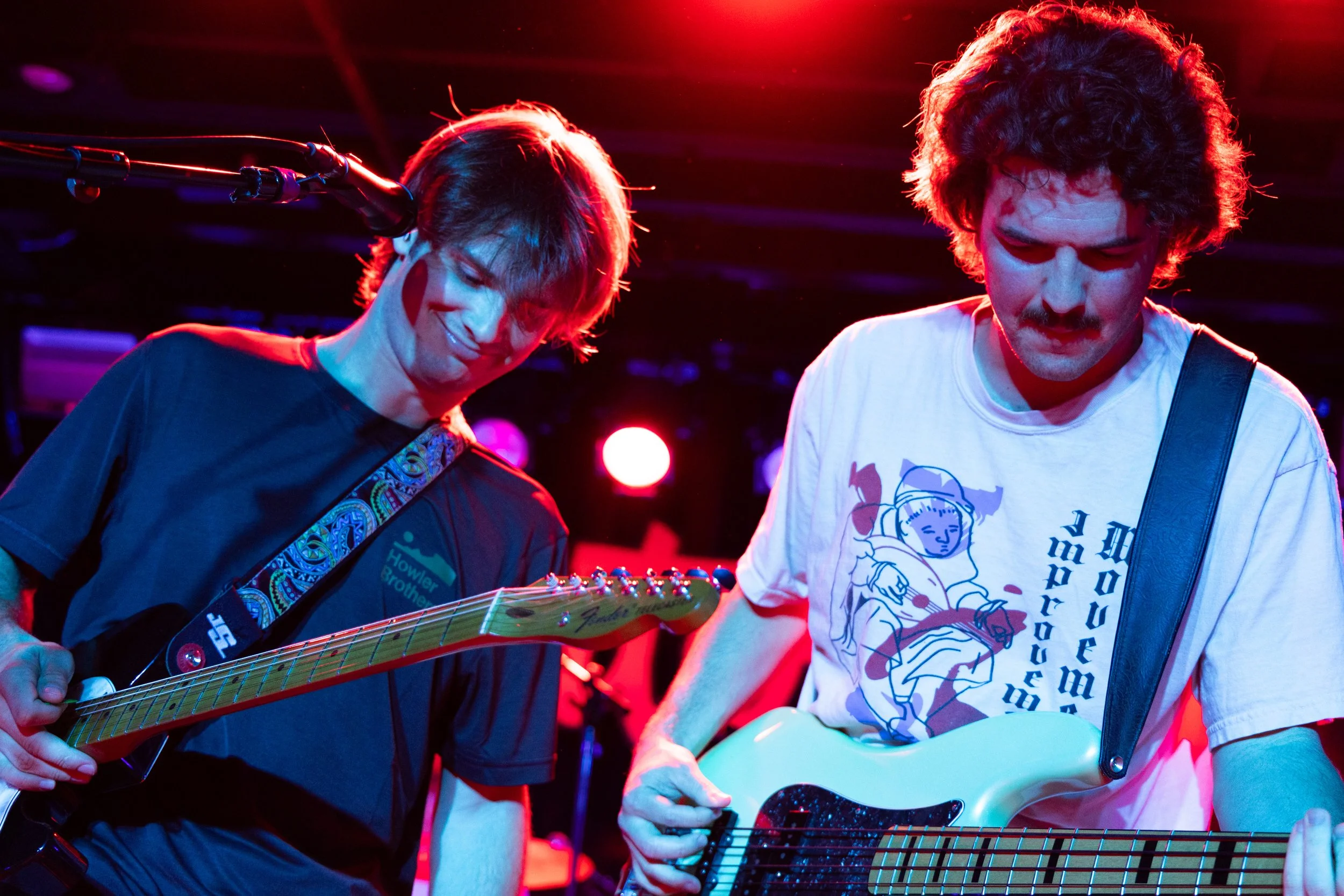  Rowland smiles as bassist Stephen Russel plays the chords to the rockified love song "XO." 