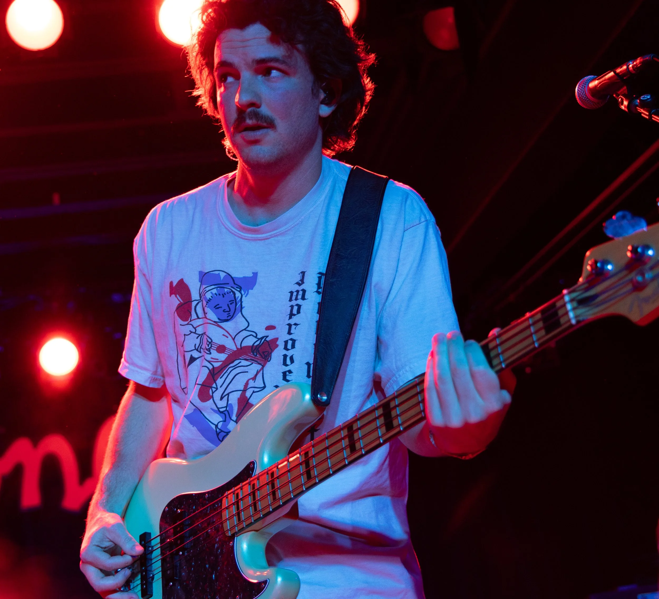  Russel plays the chords to "XO." 