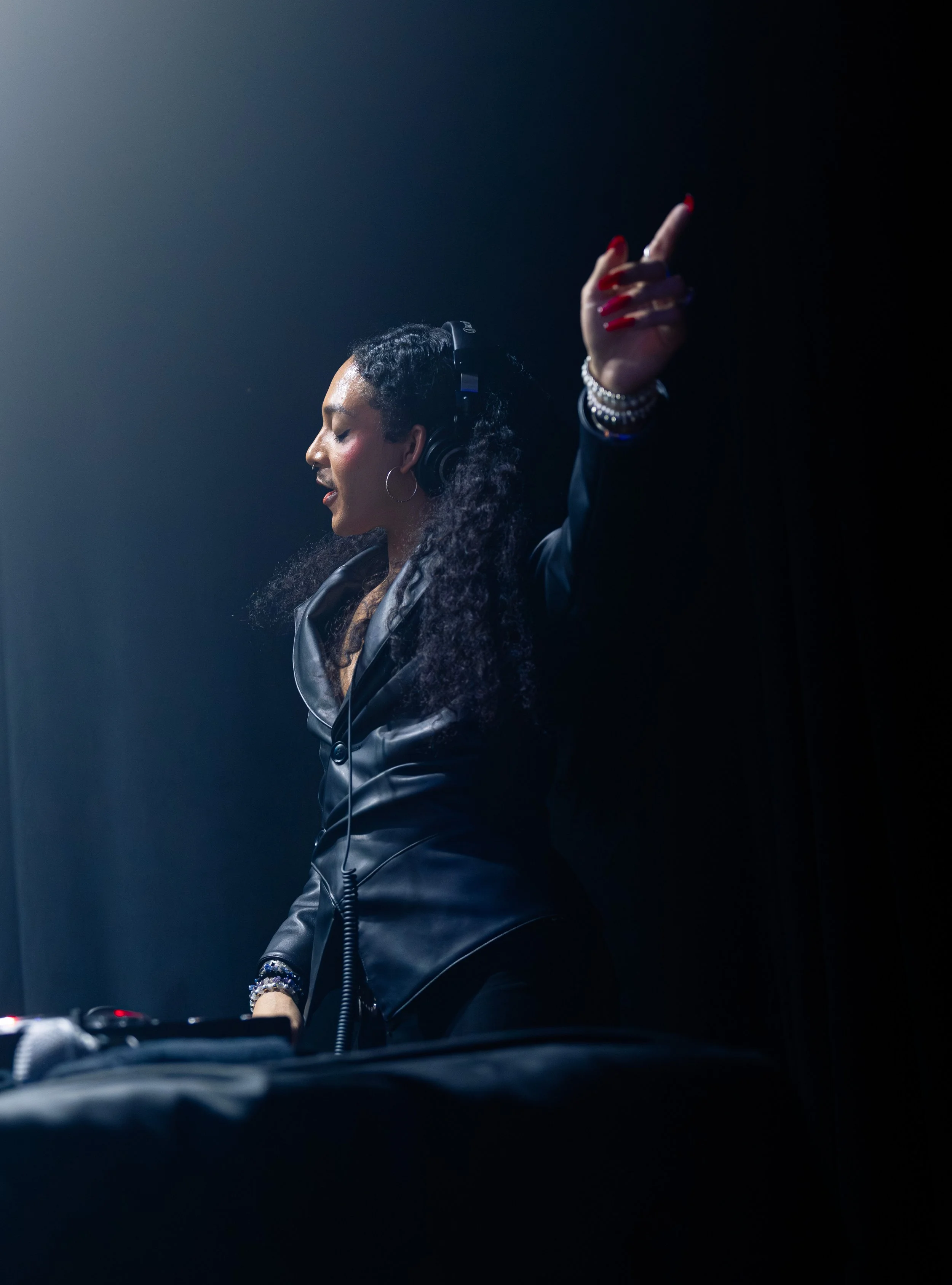  Chrysalis holds her hands up to dance during the chorus of her remix of “Water” by Tyla. 