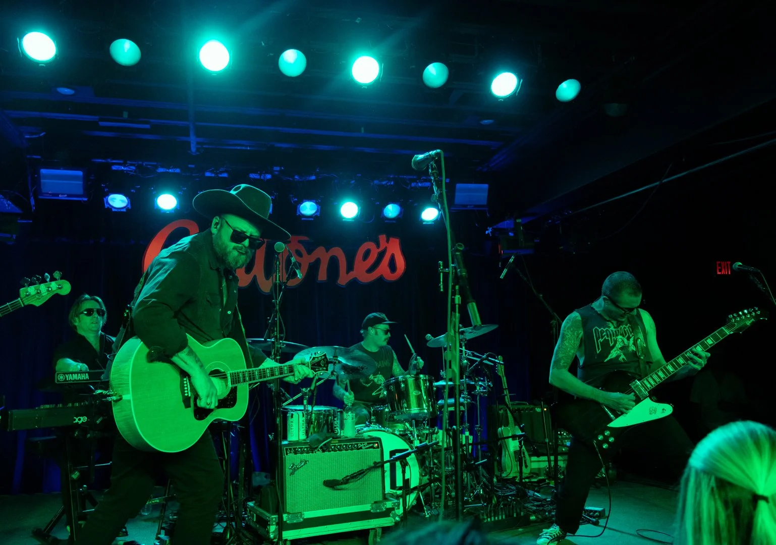  Cauthen jams out with his band during the rock-influenced country song “Black on Black.” 
