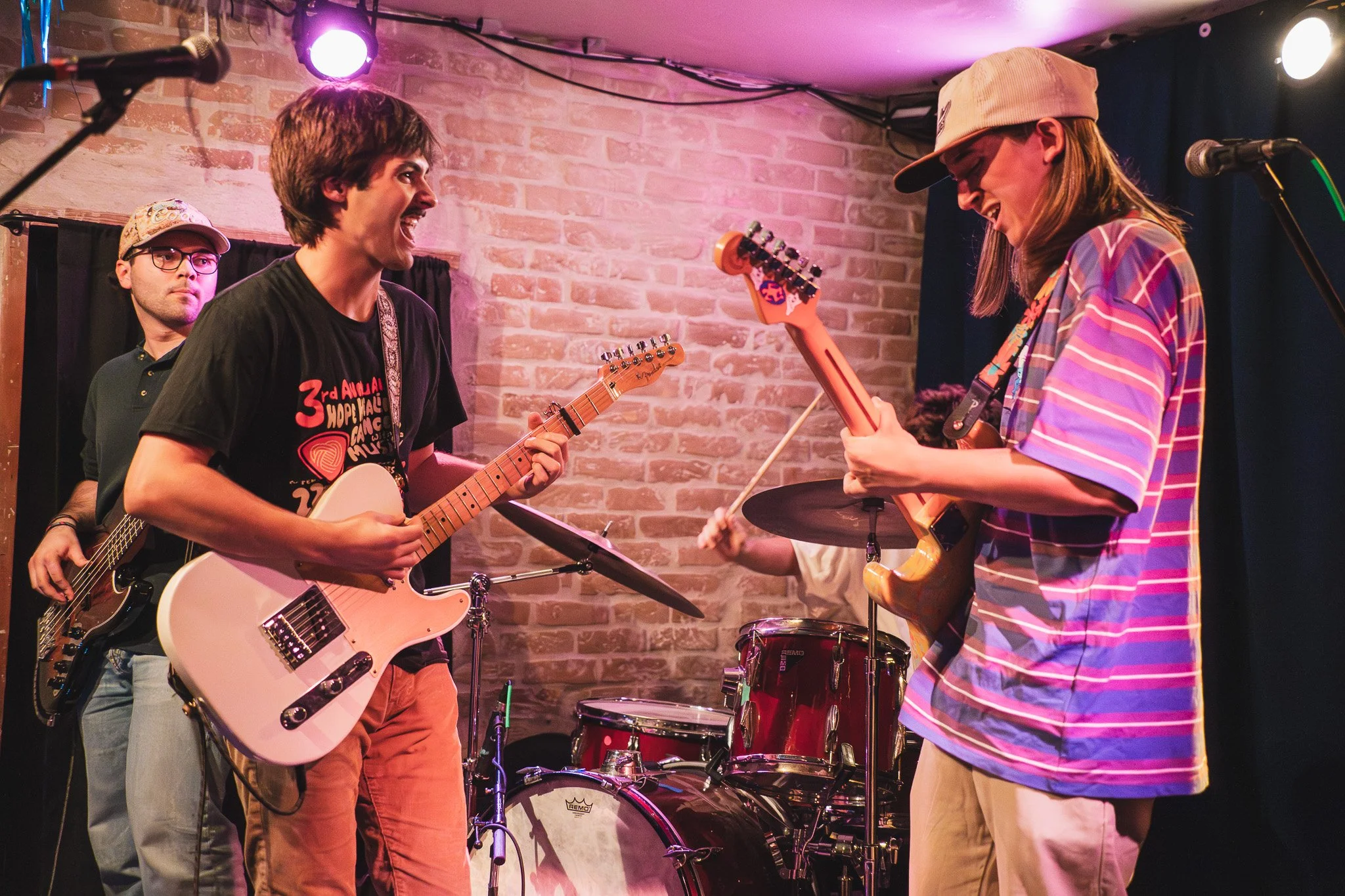  &nbsp;Lead singer Seth Eastmen and lead guitarist Cooper Littlefield exchange smiles during the performance of their new unreleased song “Badger.” 
