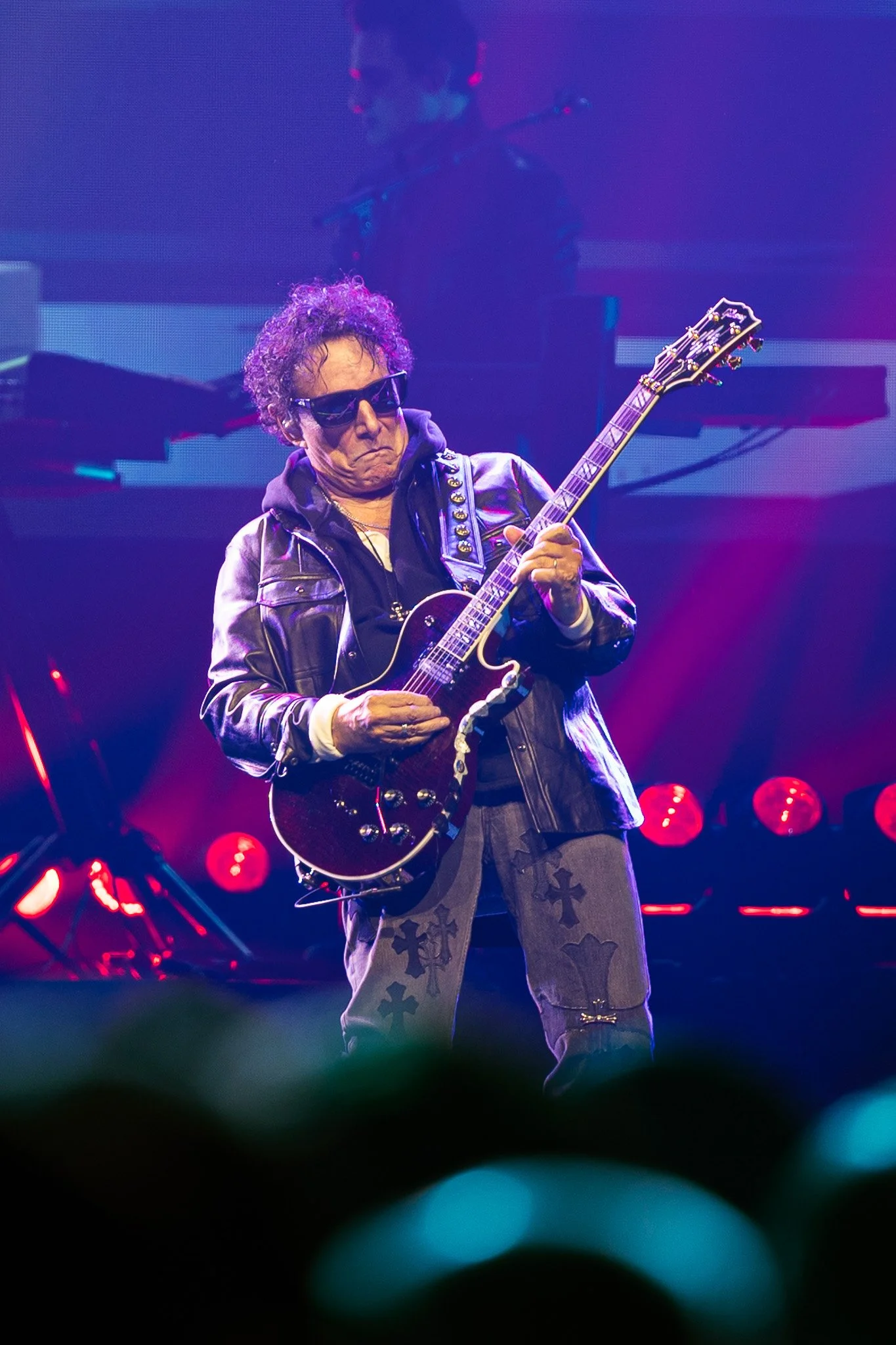  Neal Schon, the last remaining original member, performs intricate guitar riffs between songs during Journey’s ‘Final Frontier’ tour. 