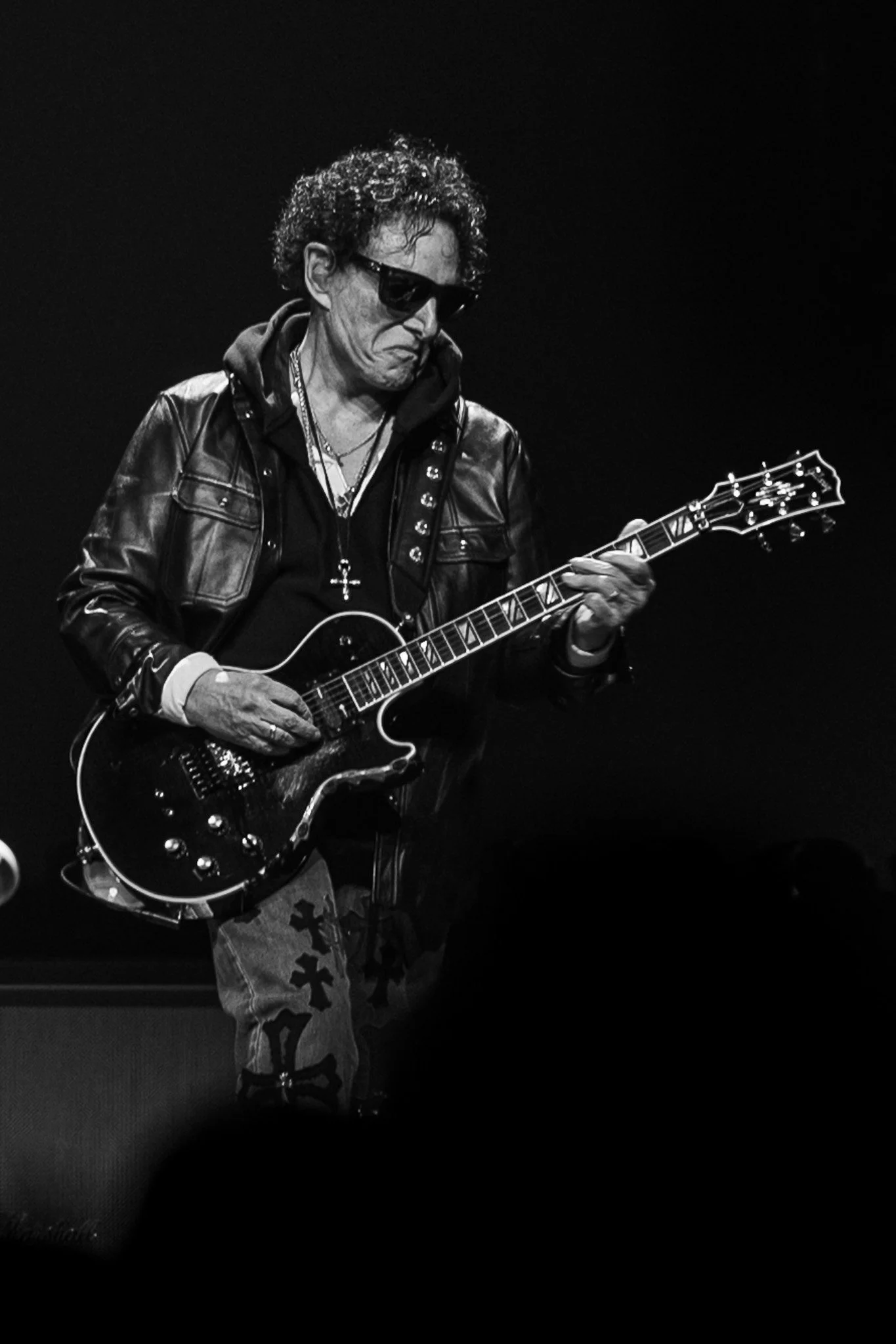  Neal Schon, the last remaining original member, performs intricate guitar riffs between songs during Journey’s ‘Final Frontier’ tour. 