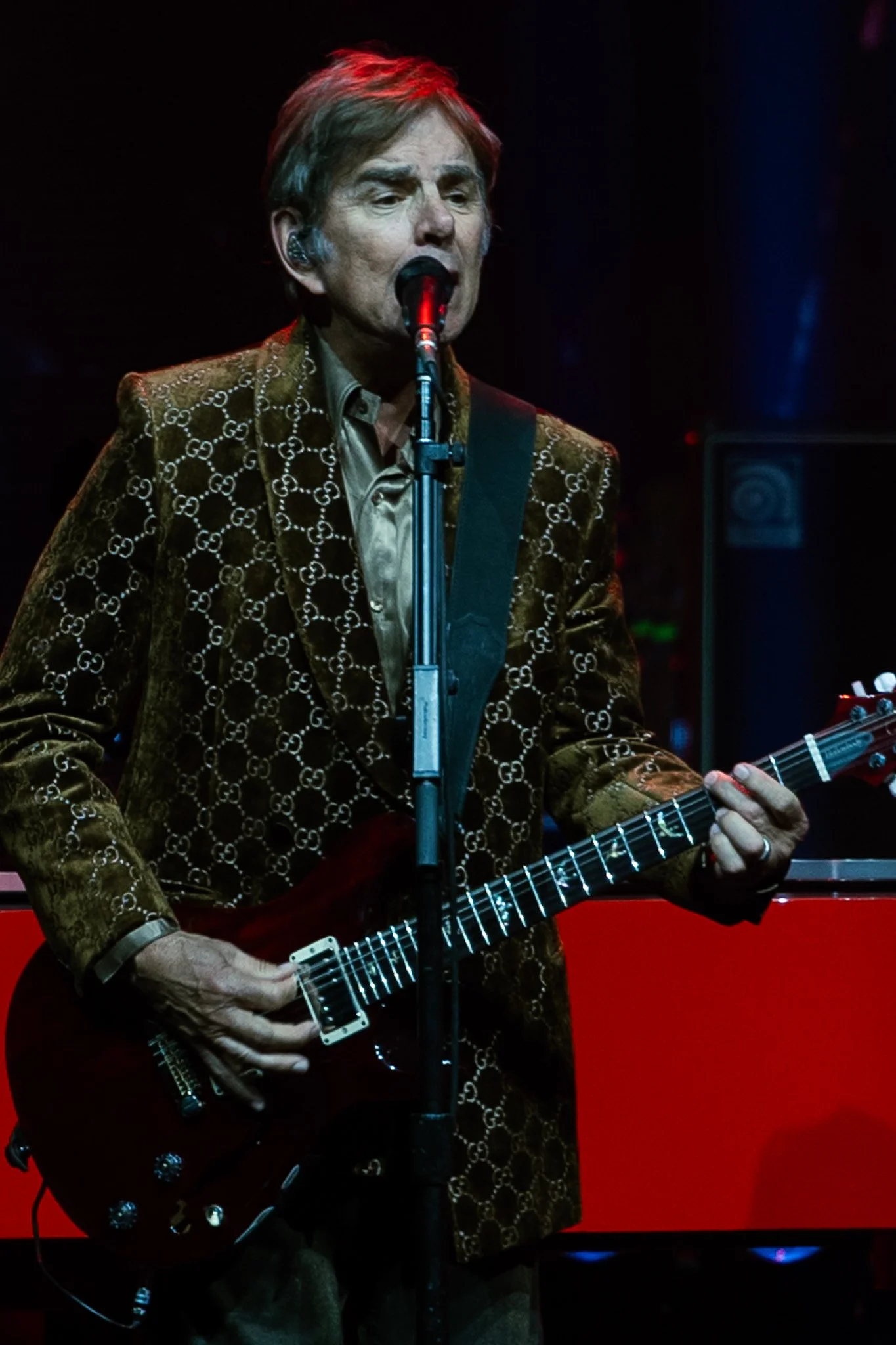  Cain steps away from the keyboard to play rhythm guitar during the band’s performance of “Ask the Lonely.” 