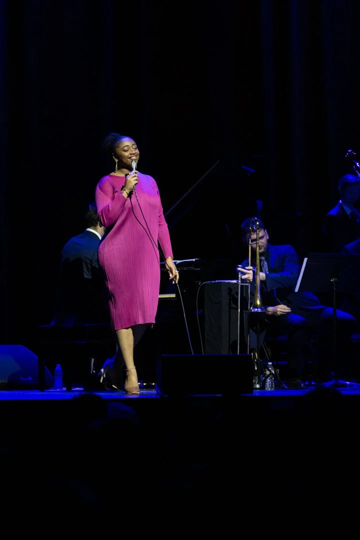  Joy smiles while singing the end of her single, “Three Little Words.” 