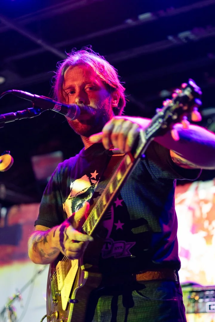  Alt-country artist Brody Price talks to the audience in between songs. 