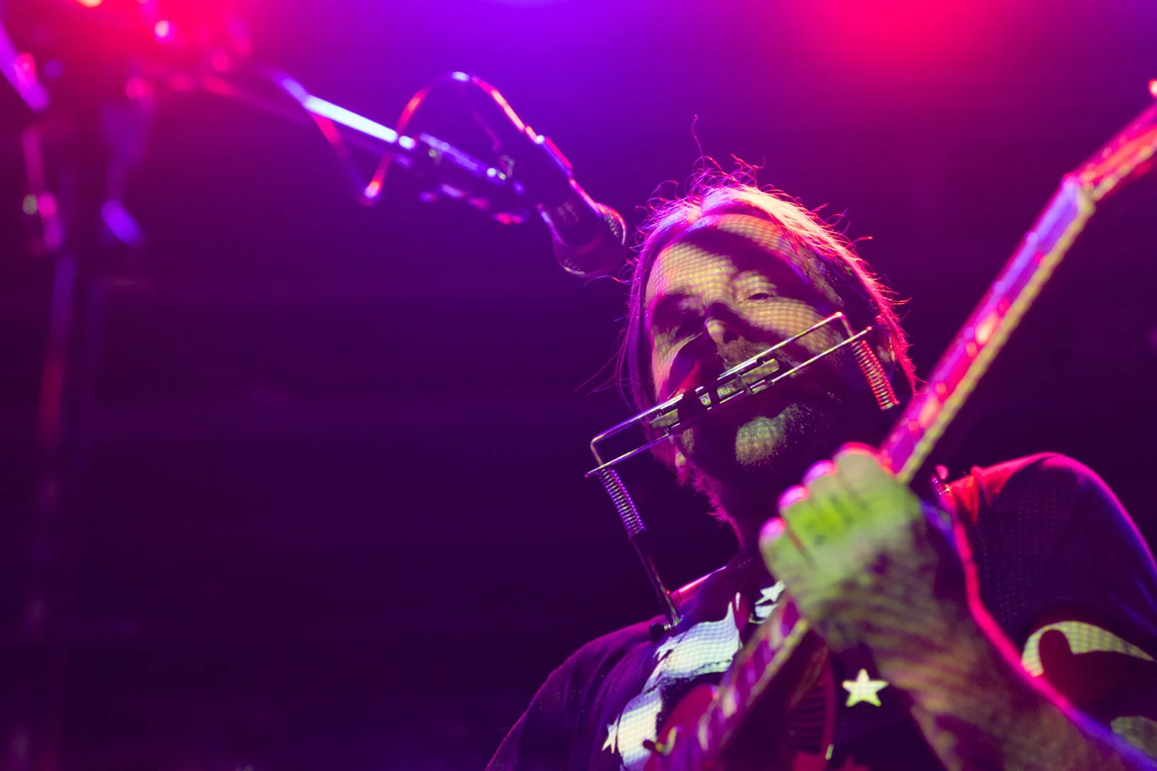  Price plays the harmonica during “In Between.” 