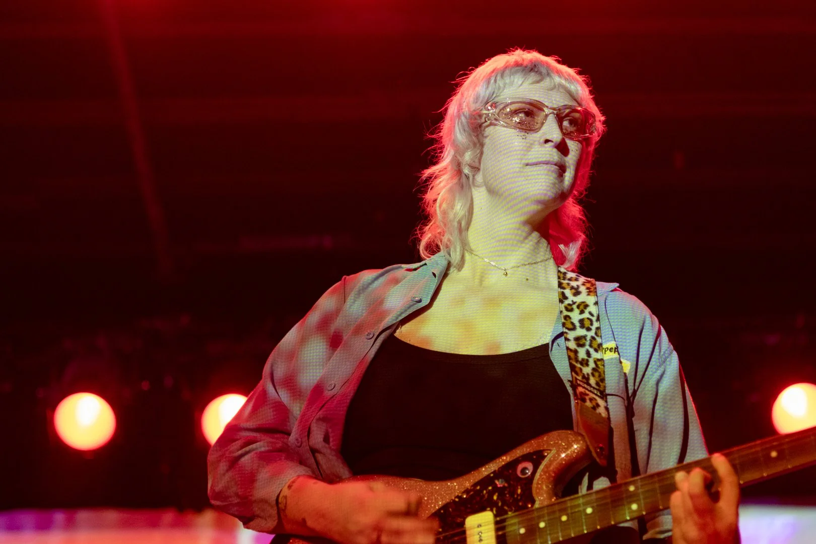  Cooper looks into the crowd during the instrumental part of “Je T’aime.” 