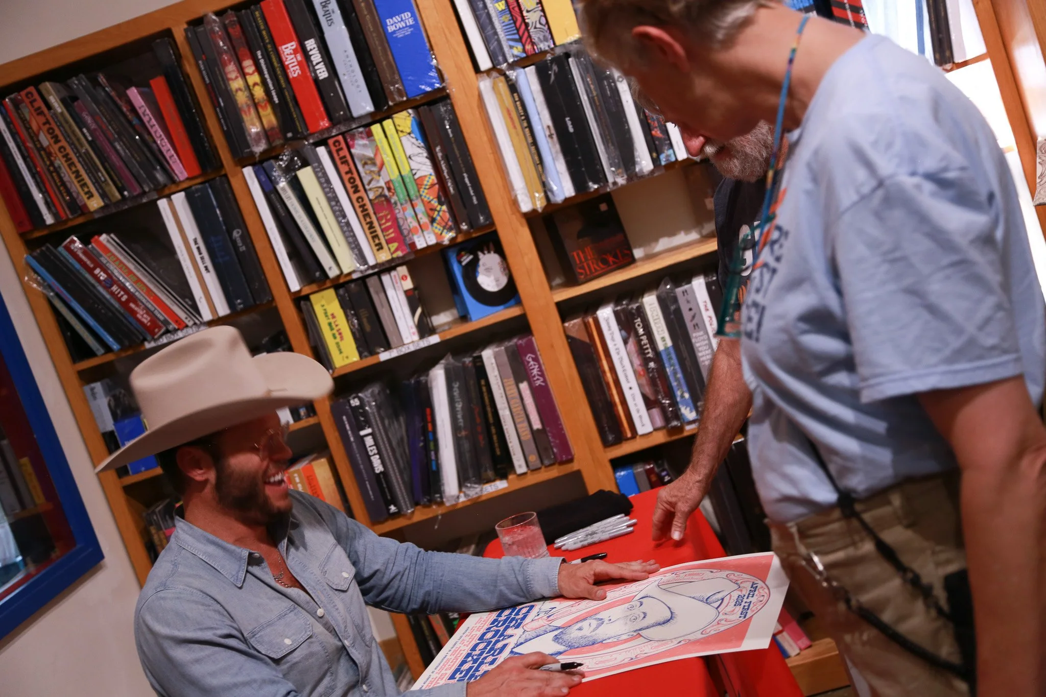  Crockett signs his newest record  Age of the Ram  for ecstatic fans. 