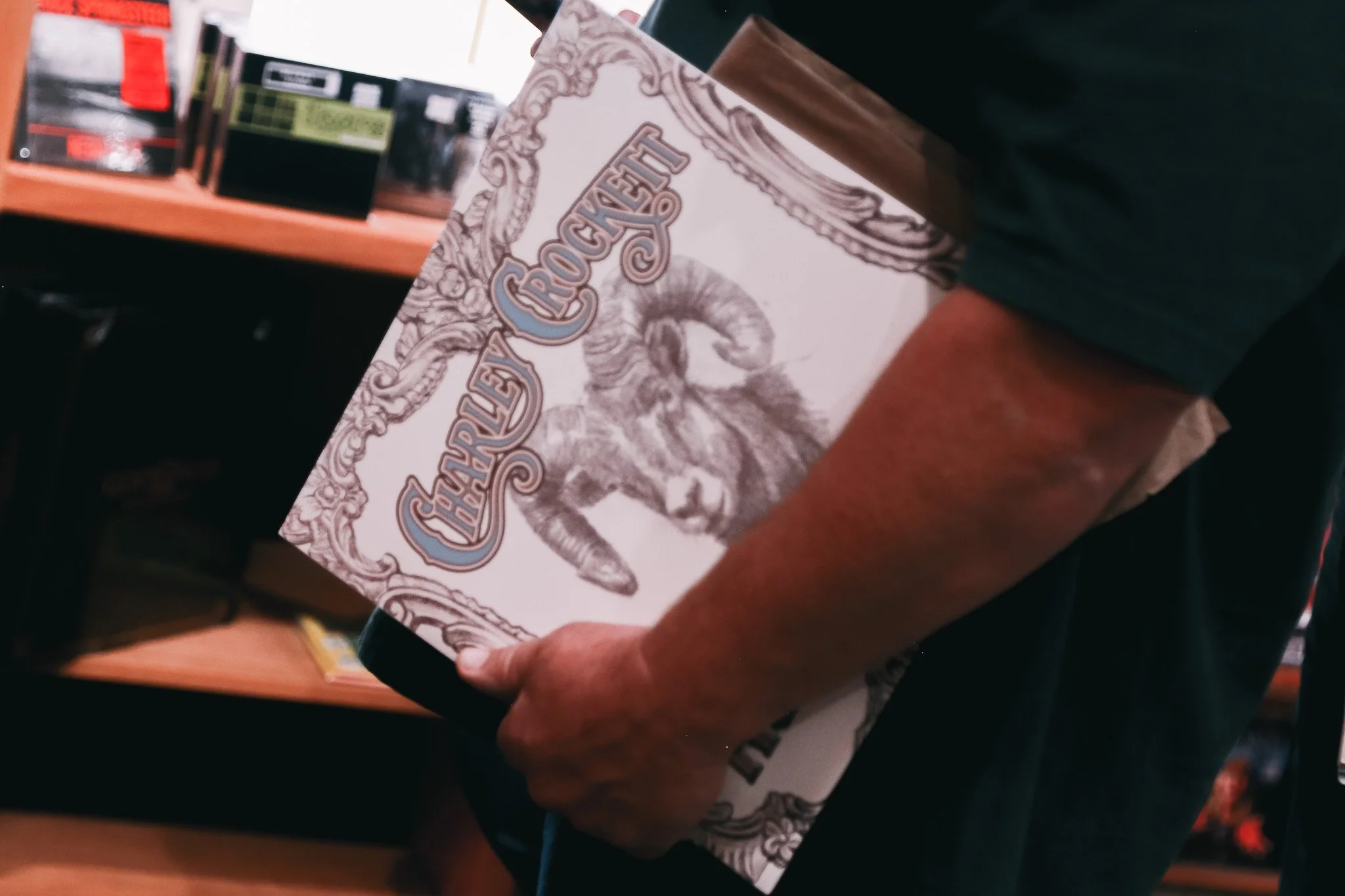  Crockett signs his newest record  Age of the Ram  for ecstatic fans. 