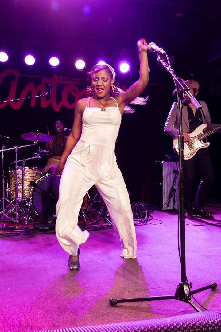  Lead singer Tierinii Jackson dances to the funky groove song “Rum Boogie.” 