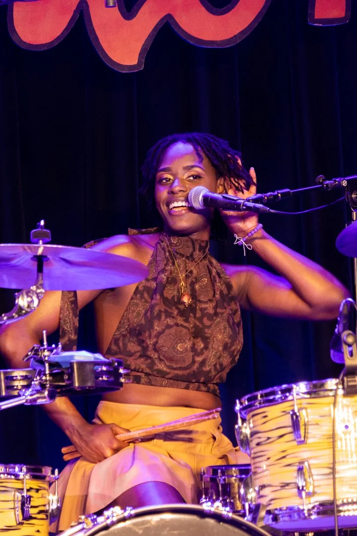  Drummer Tikrya Jackson asks the audience for more noise in between songs. 