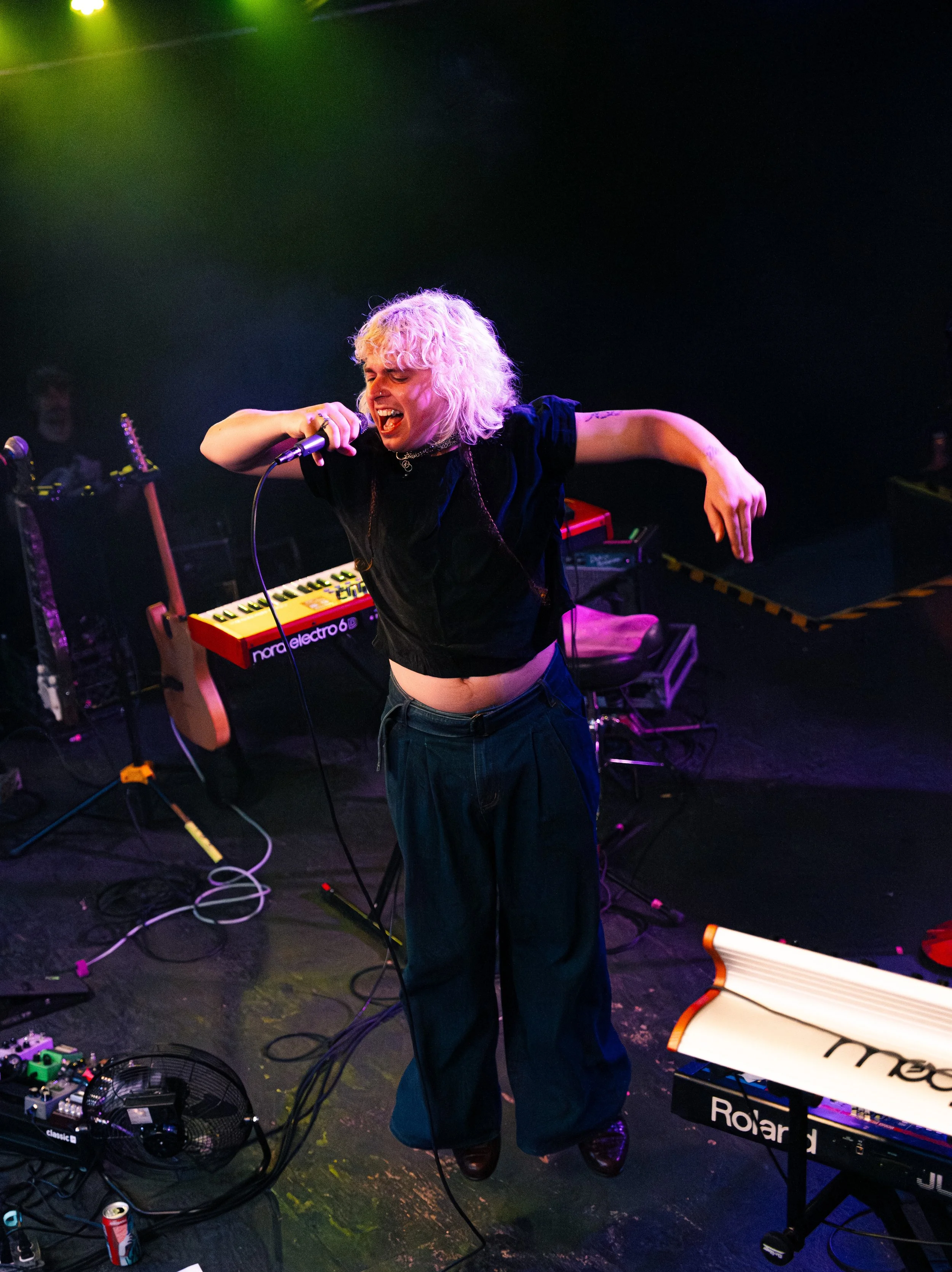  Mothé jumps up and down while singing the energetic title track “Total Popstar” from their latest album  Total Popstar.  