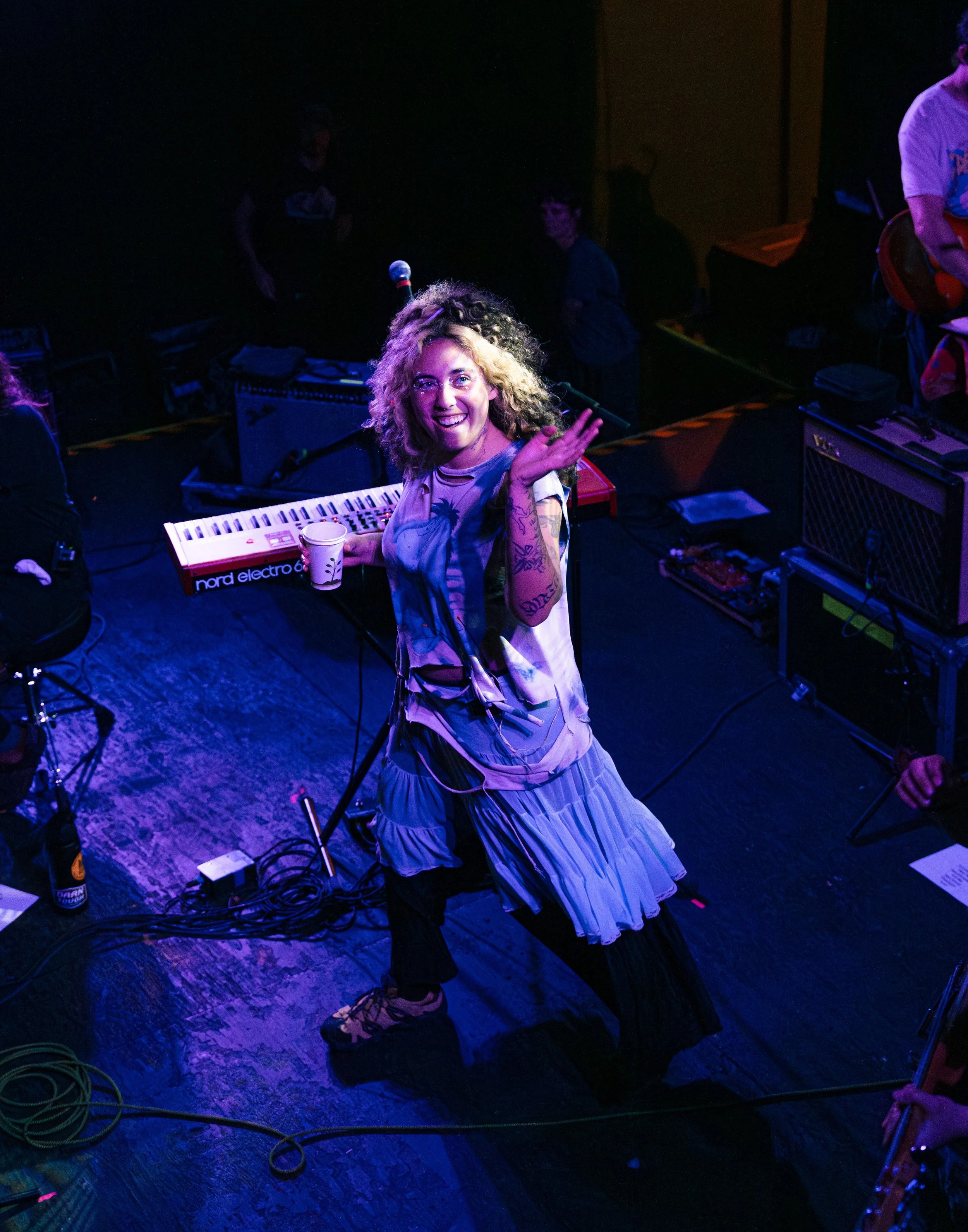  Indigo De Souza waves at the crowd on the balcony as she takes the stage to perform “Be My Love” from her latest album  Precipice.  