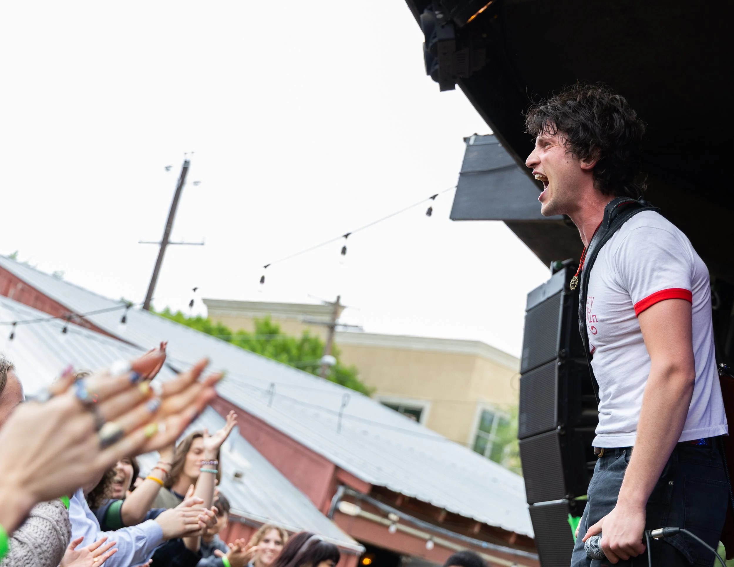  Hamm screams out to the crowd while performing “Commotion”: “Where do you go / When you look to the future / When you look to the future / The shackles have shown. 